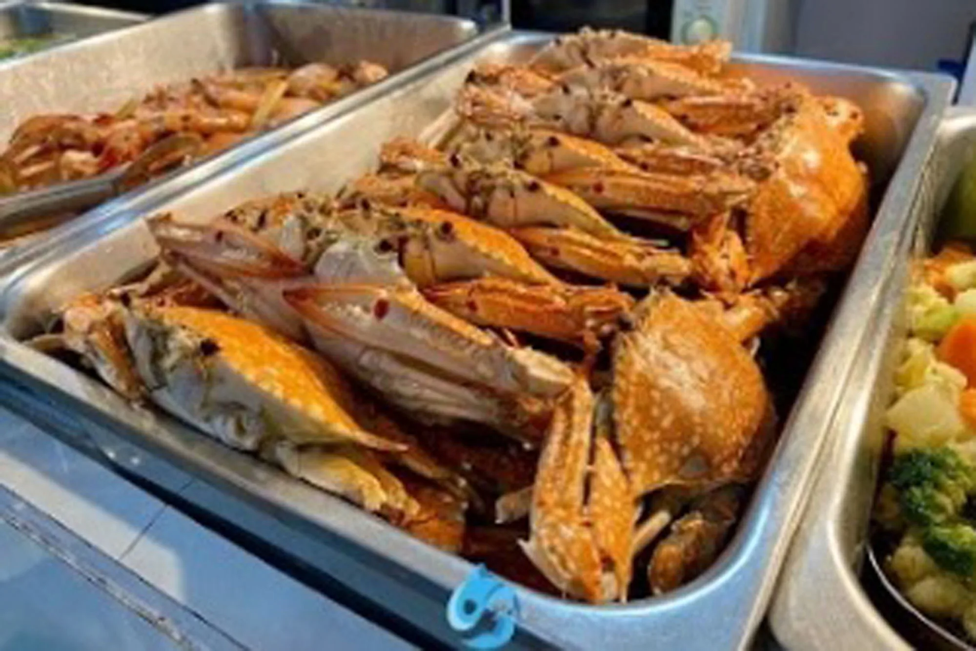 Blue swimmer crabs on the buffet — dinner aboard Krishna 3