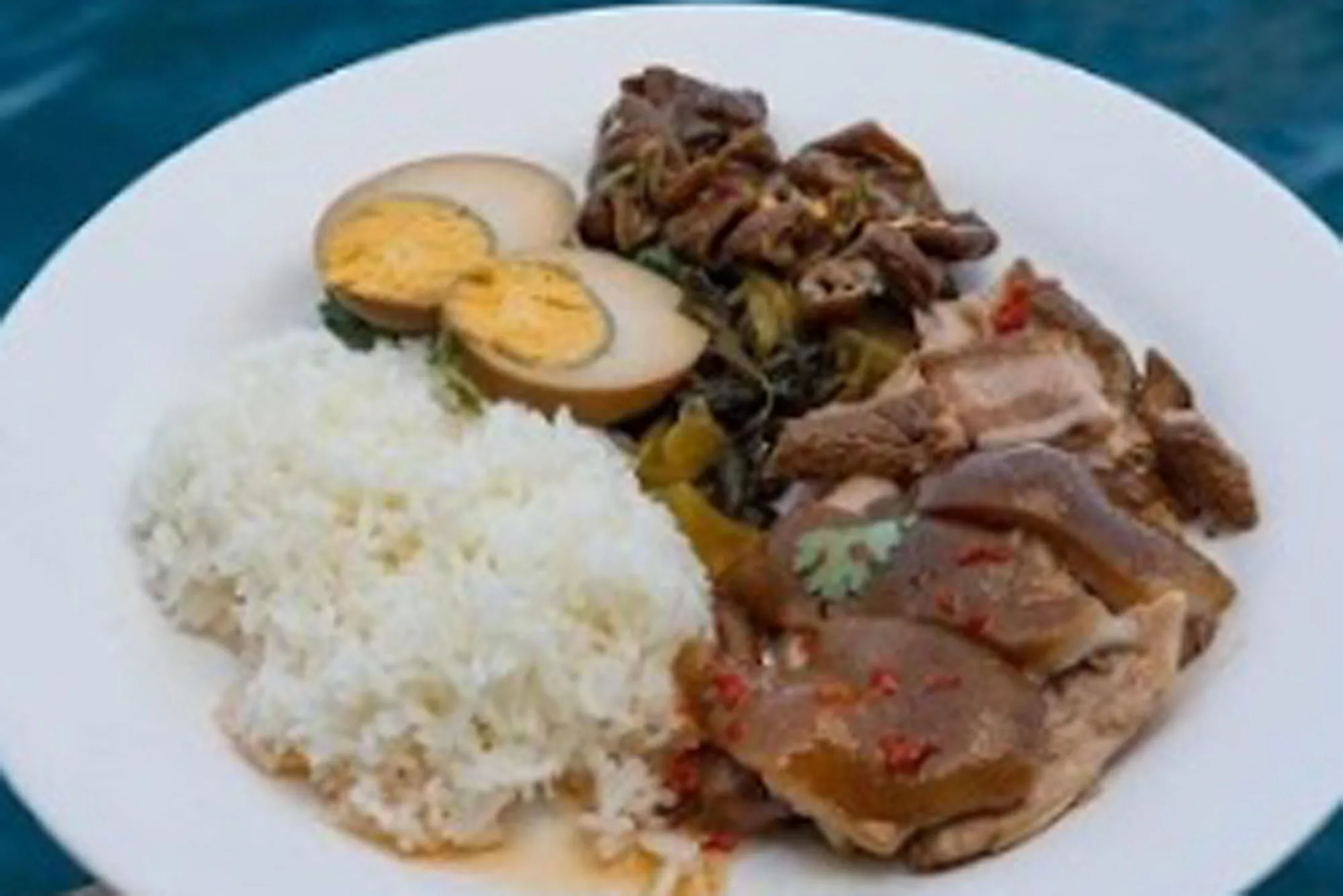 Lunch on Krishna 3 — rice, braised pork and Thai-style eggs