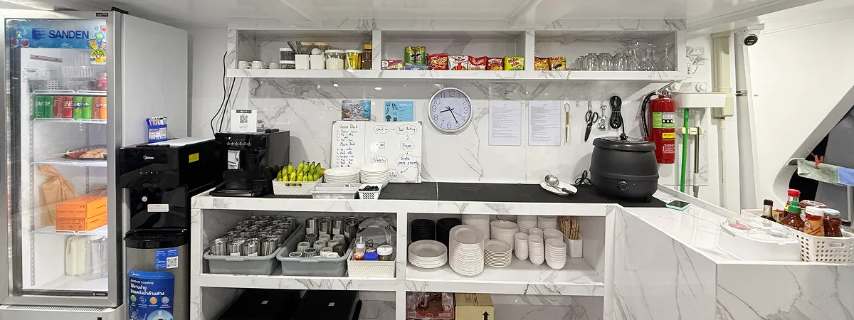 Krishna 3 pantry with a coffee machine and crockery