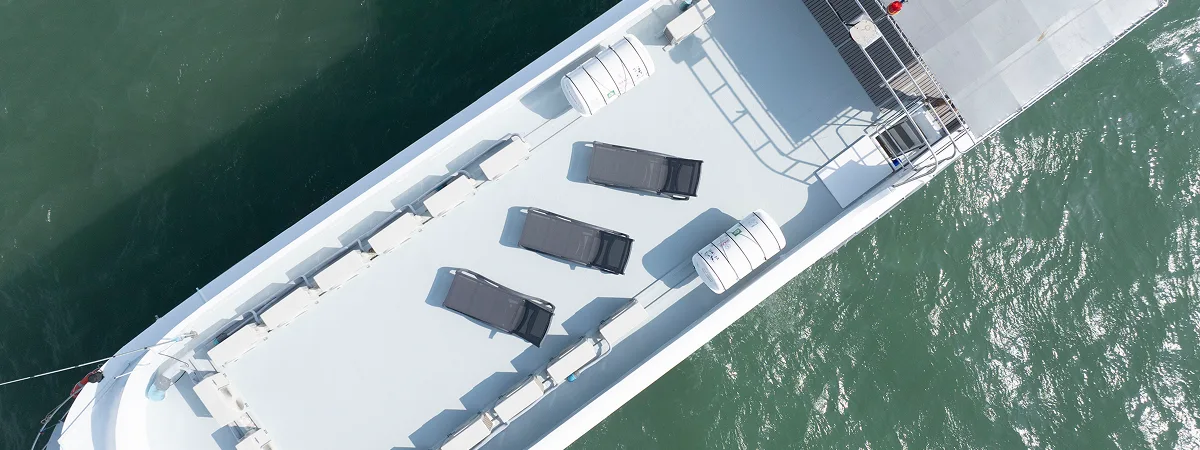 Krishna 3 sun deck from above with loungers along both sides