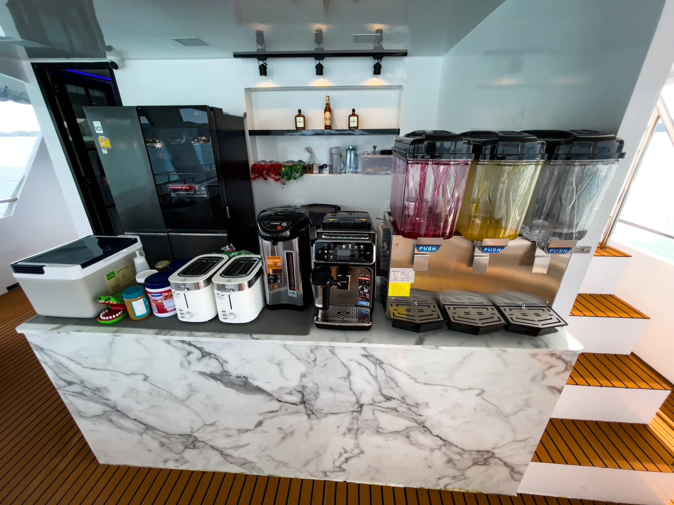 Drinks station with juices, coffee and tea on board