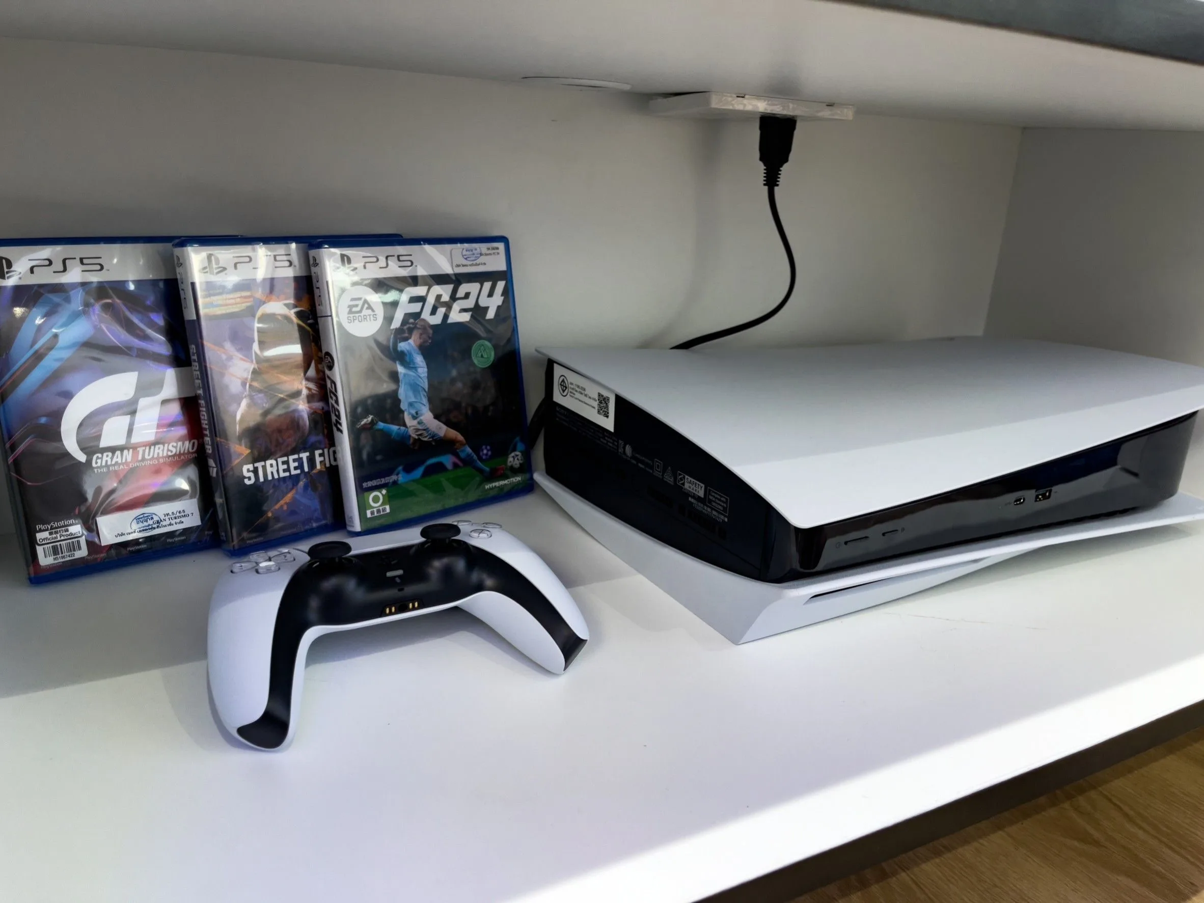 Gaming corner of the saloon — PlayStation 5 with games