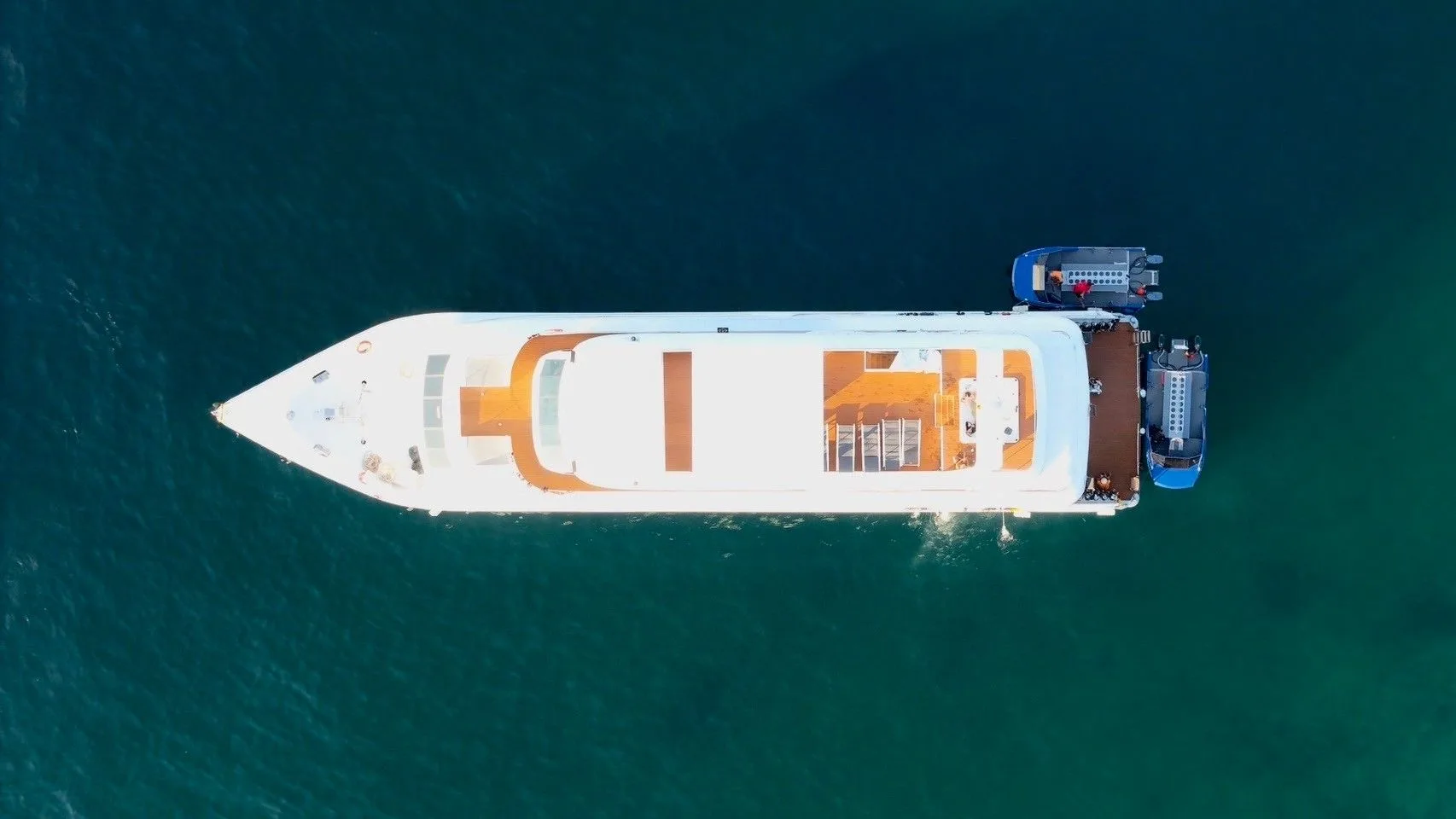 Looking down on the decks of Mandarin Queen 9 and the tenders alongside