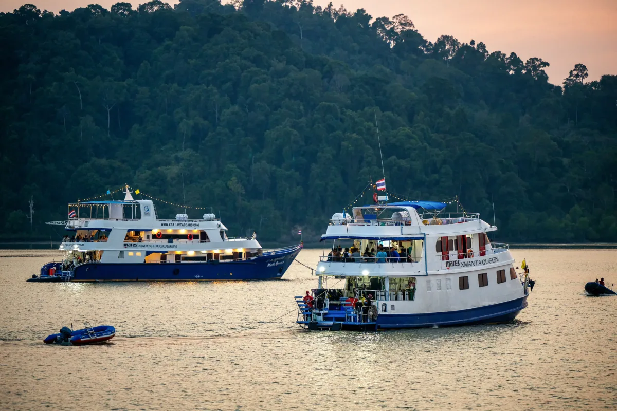 Manta Queen 2 at anchor beside another vessel of the fleet