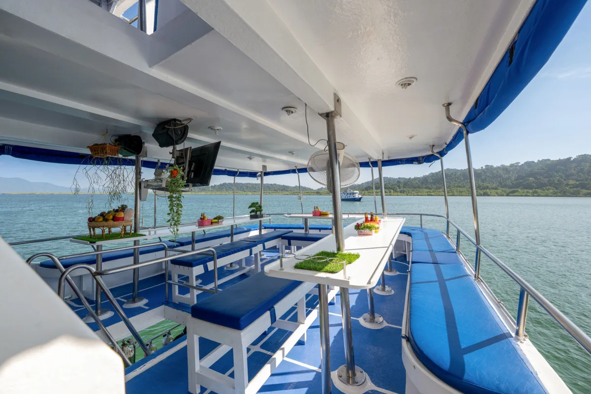 Sun deck of Manta Queen 2 with soft mats under the awning