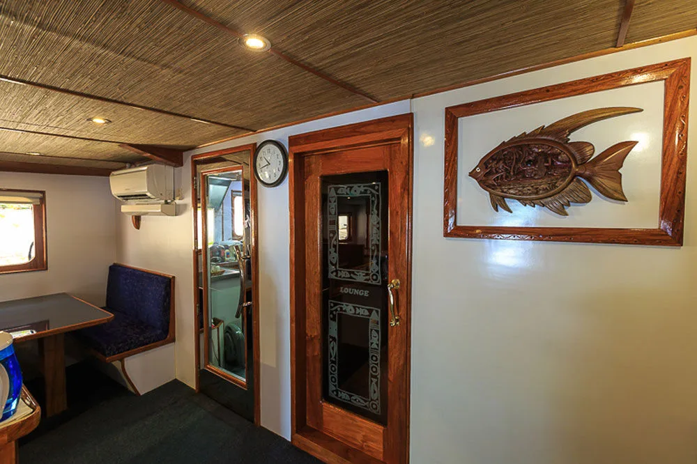 Interior of Ocean Hunter 3 with carved decor