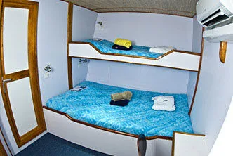 Deluxe cabin on Ocean Hunter 3 — basin and mirror by the entrance