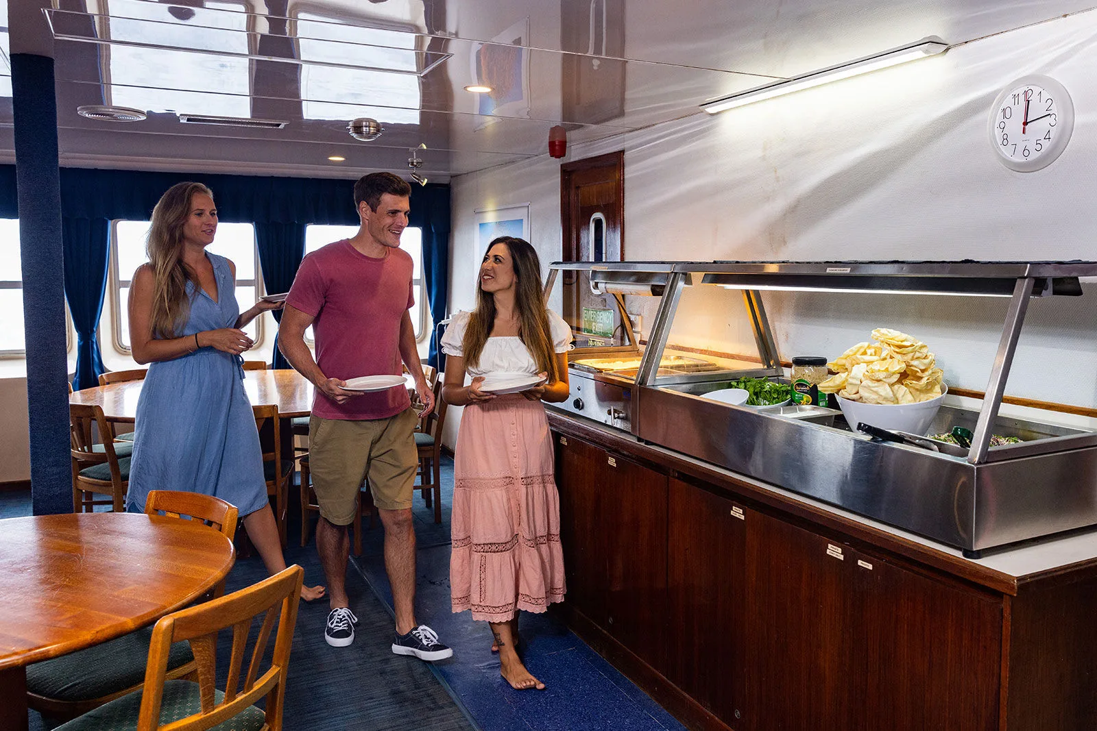 Buffet service in the dining room as guests pick their meal