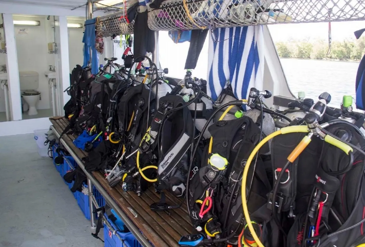 Individual dive stations on the dive deck of Pacific Master