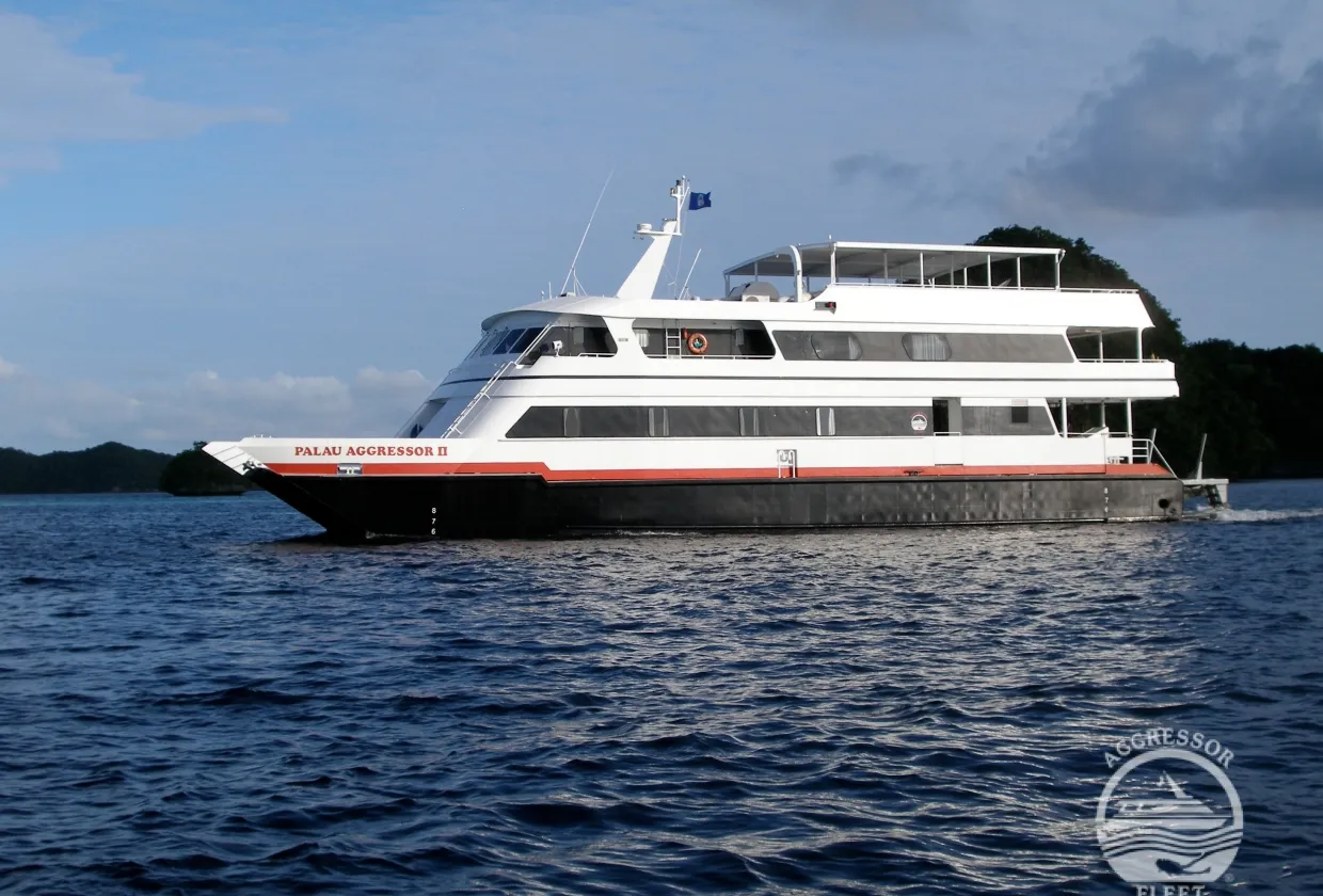Palau Aggressor II cruising along the green islands