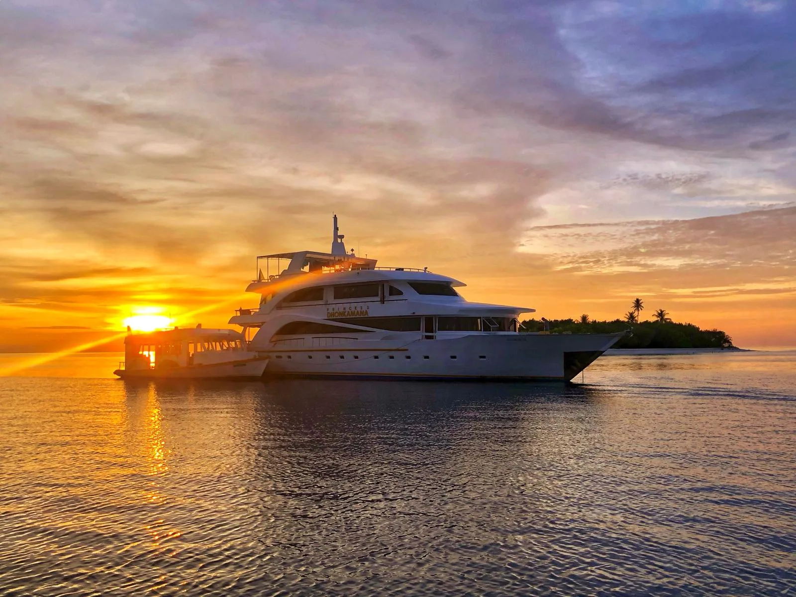 Princess Dhonkamana at sunset off an island