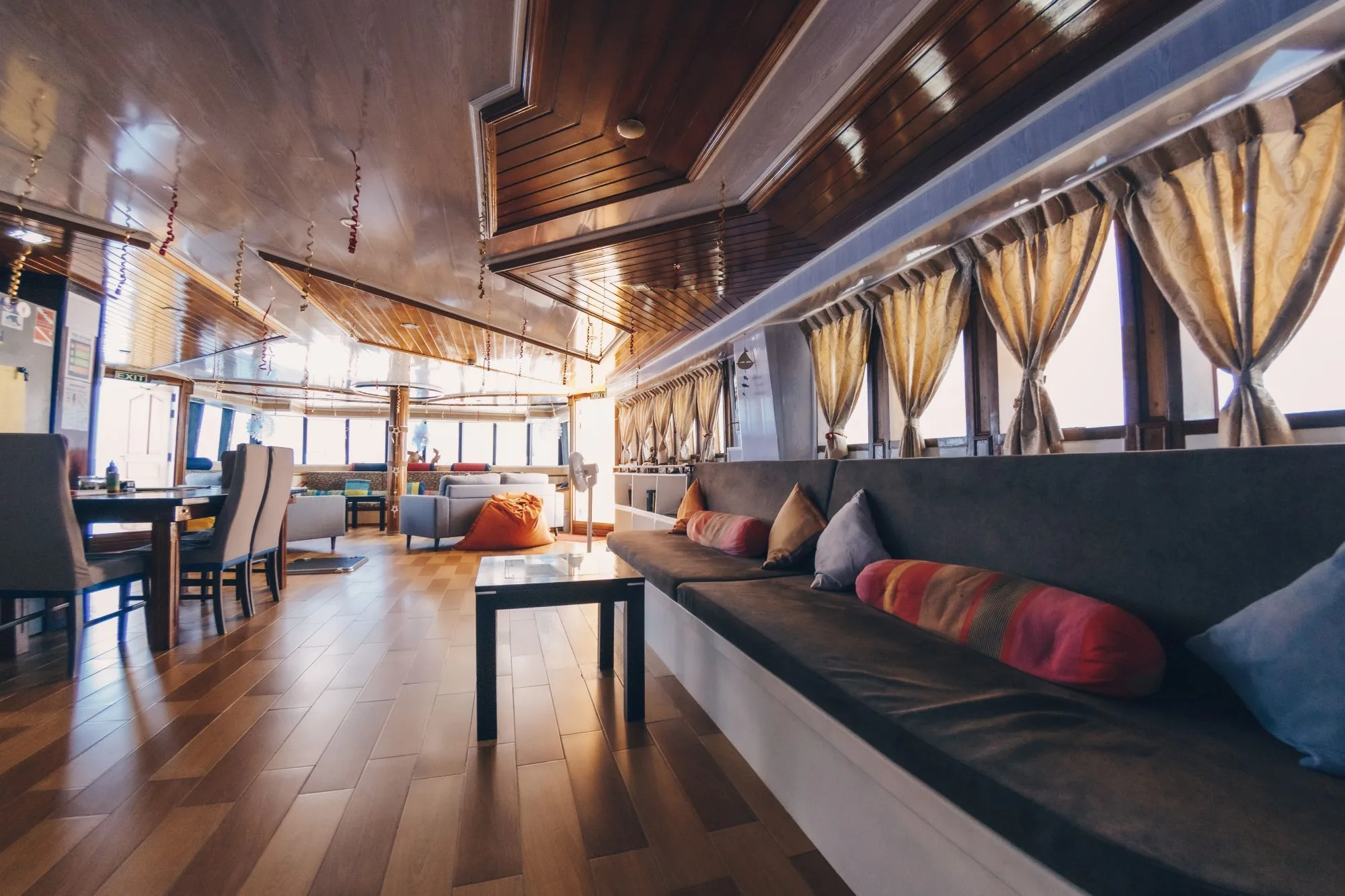 Saloon of Princess Dhonkamana with sofas and wood panelling