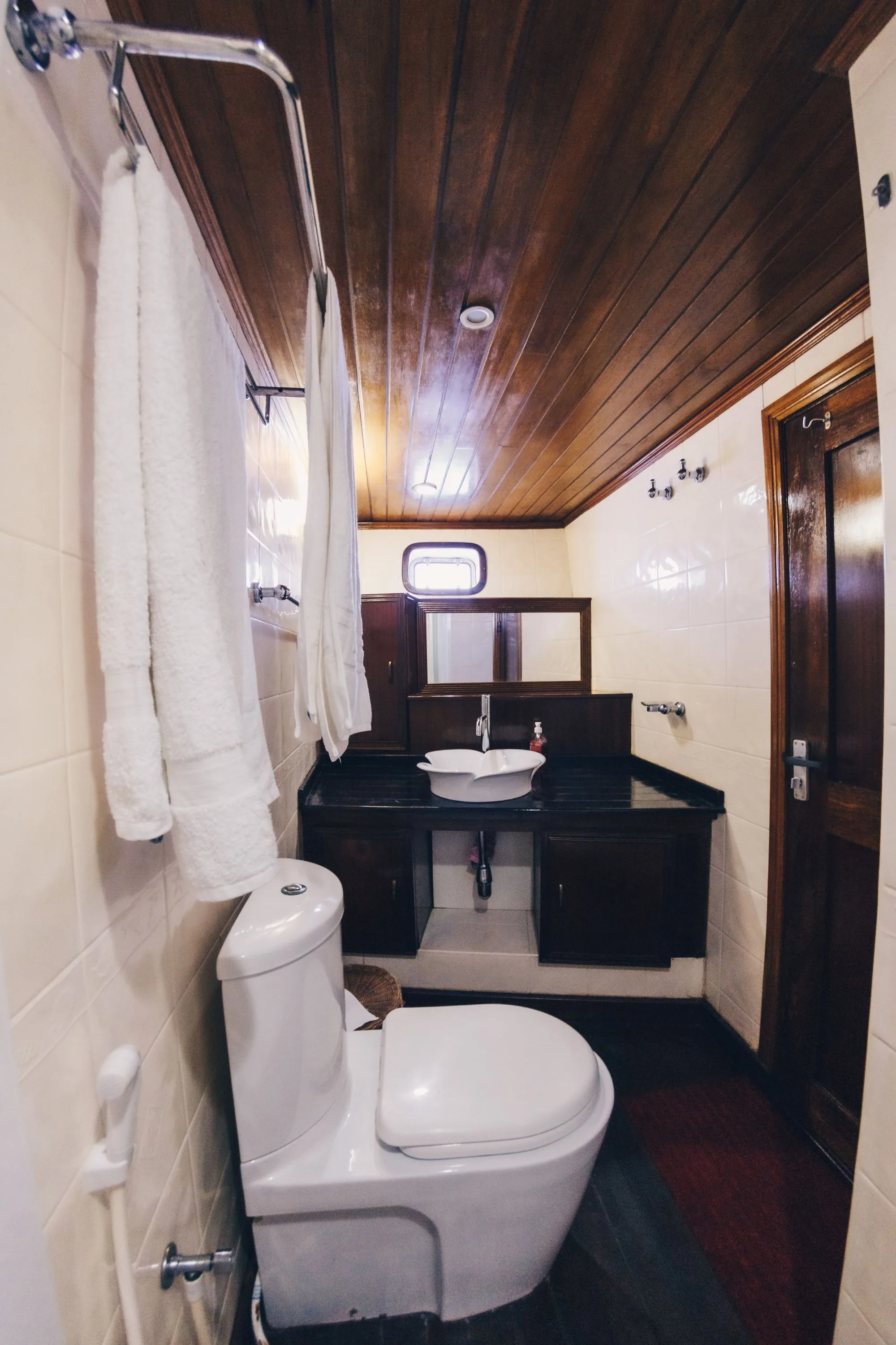 Bathroom on Princess Dhonkamana with shower area and towels