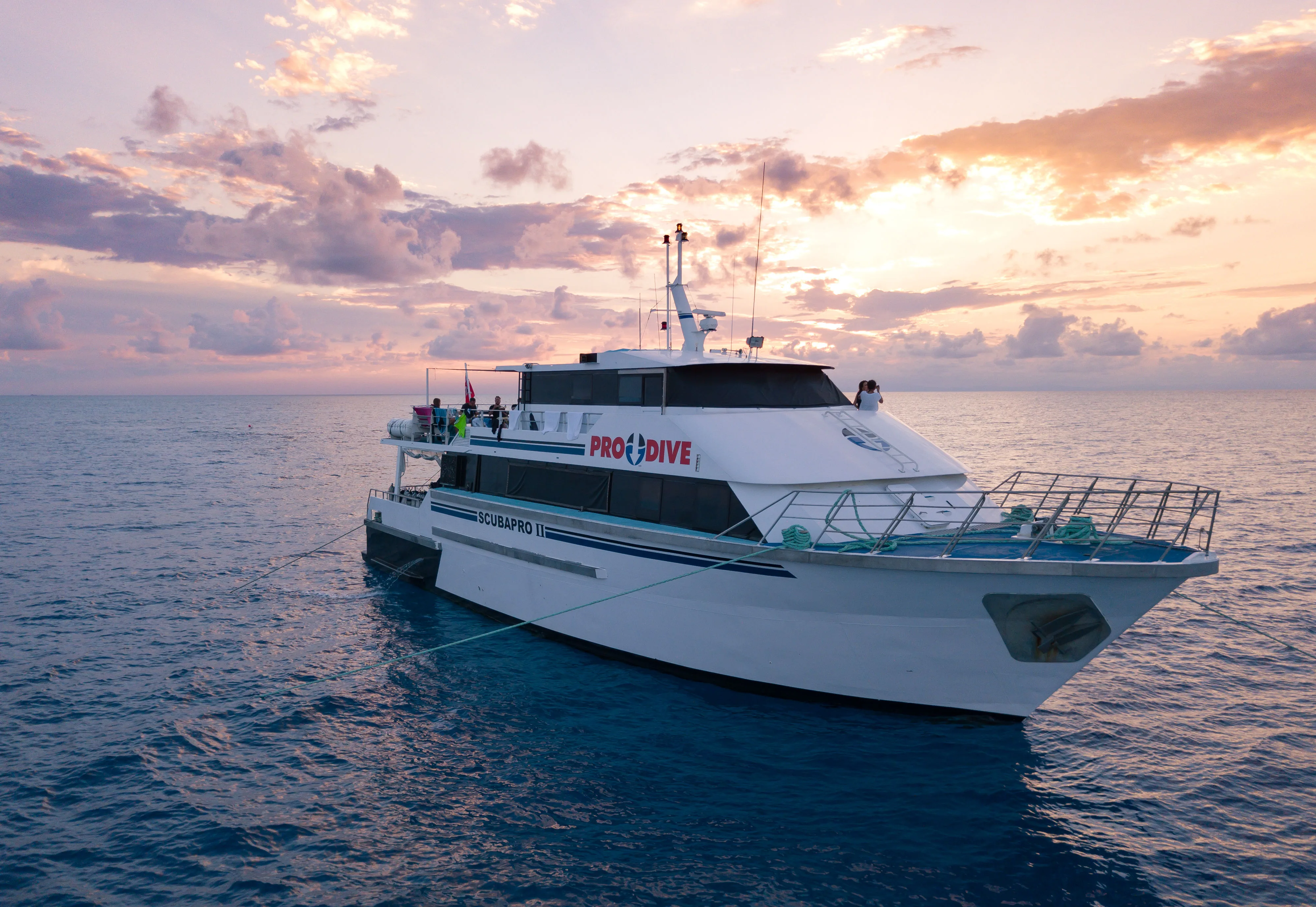 Pro Dive Cairns catamaran at sunset on the Great Barrier Reef