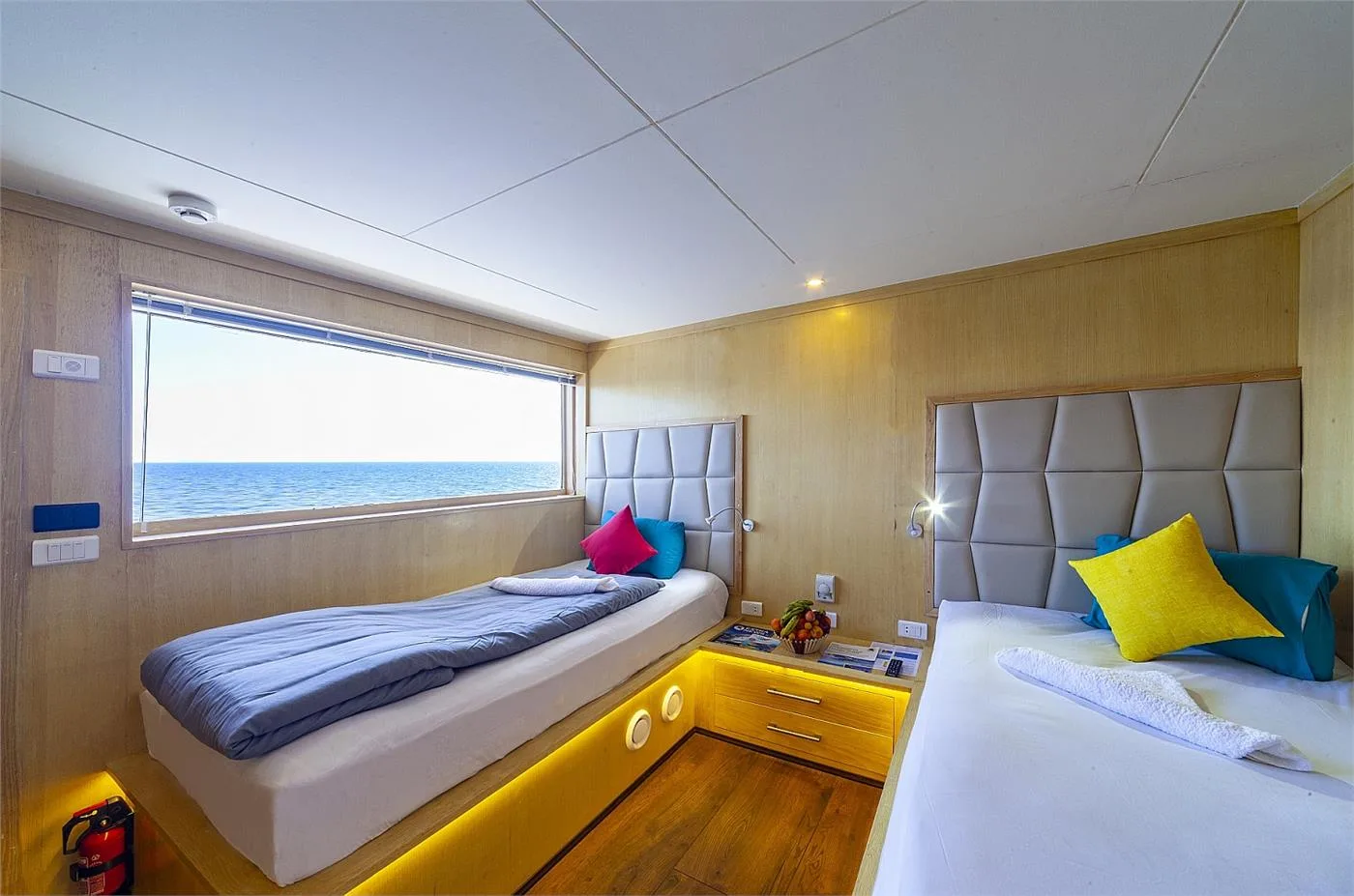 Superior upper deck cabin — bed and hull window