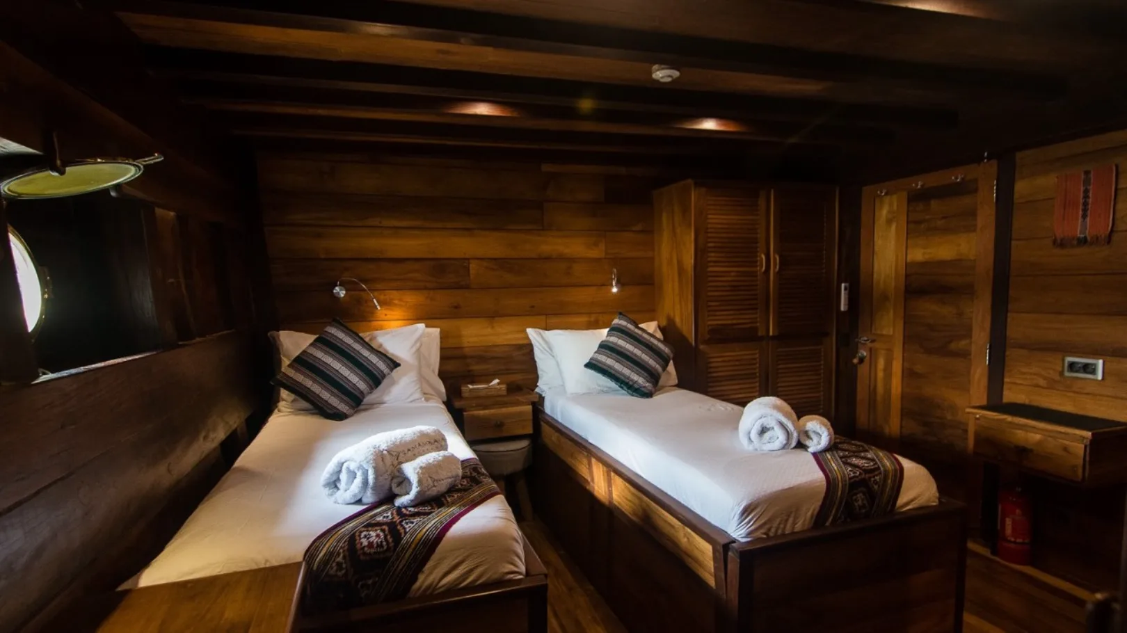 The same cabin split into two single beds