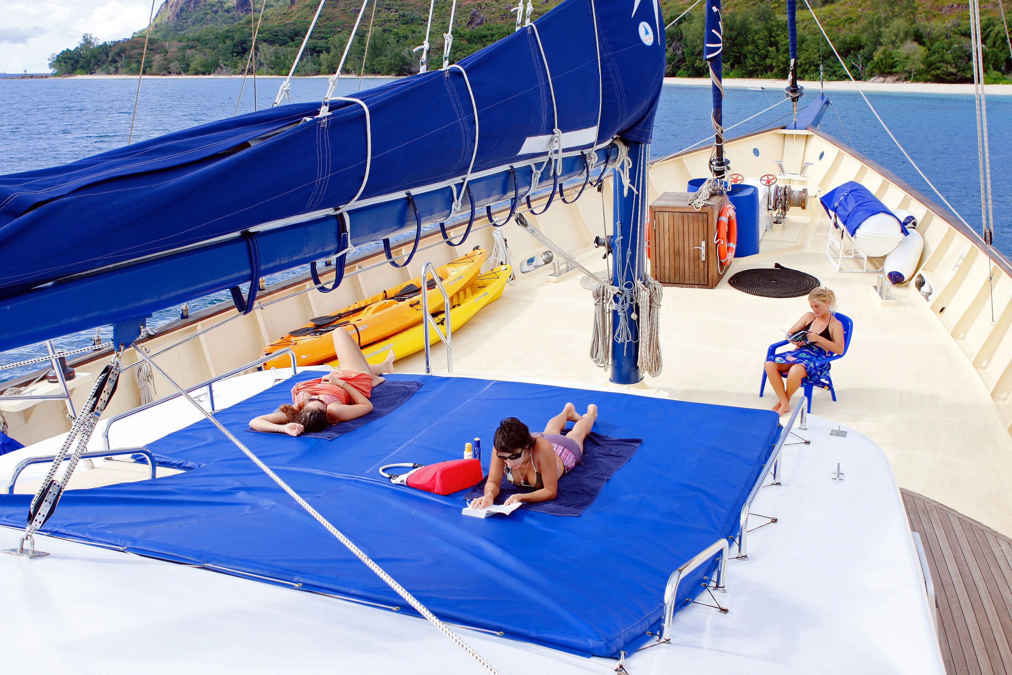 Sun deck with mattresses, loungers and kayaks