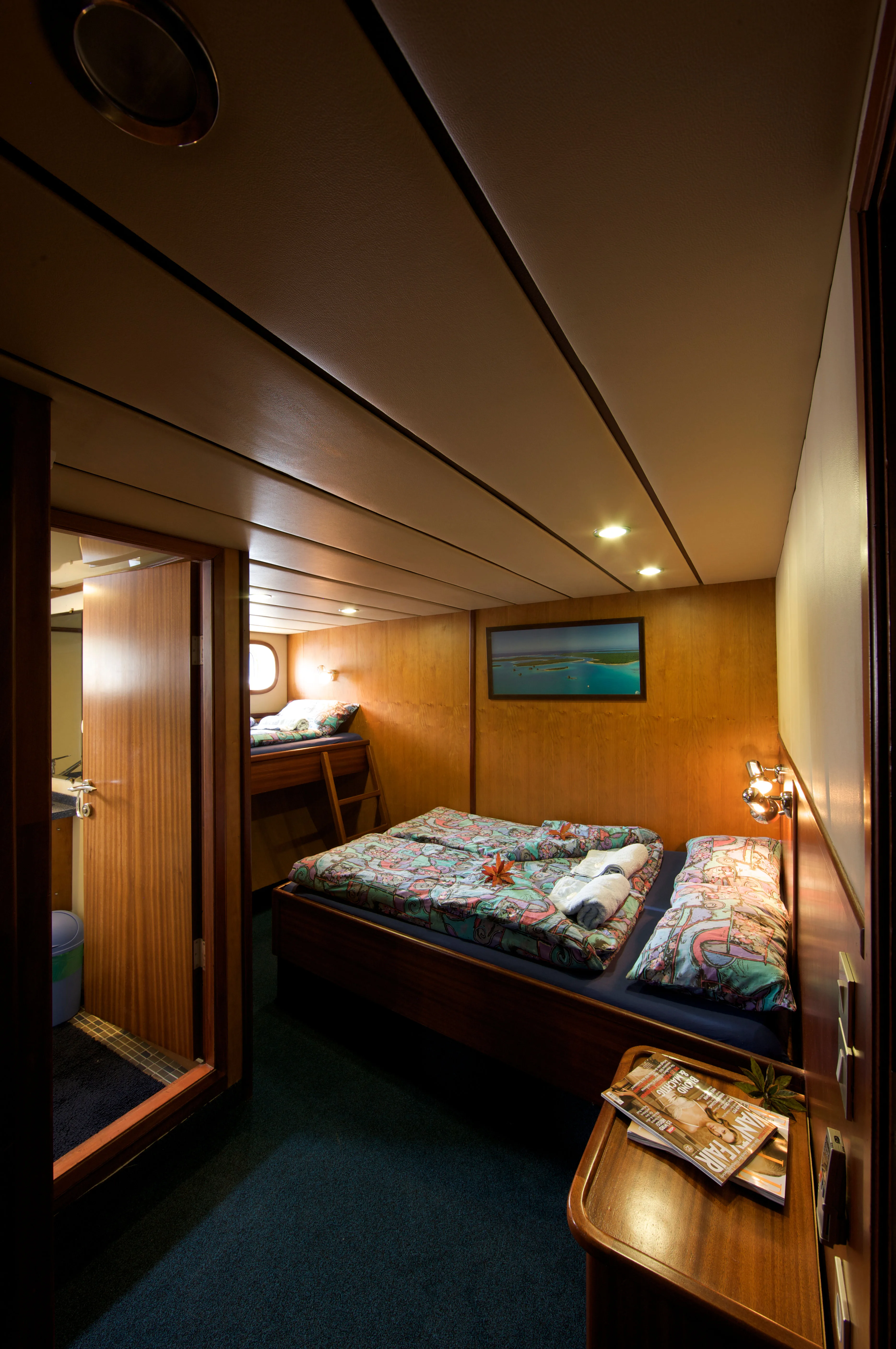 Full length view of a Sea Bird triple cabin with a dressing table