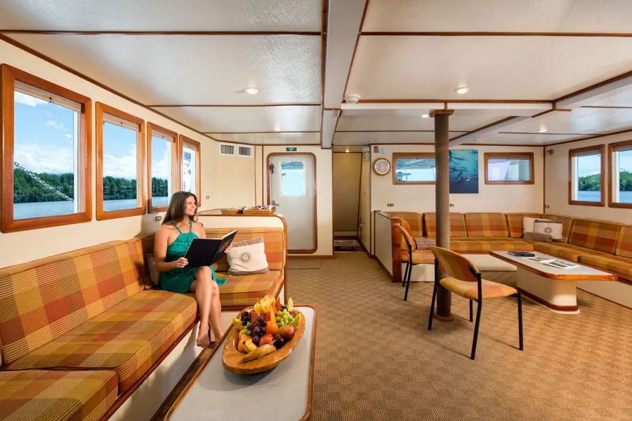 Wide view of the Sea Hunter saloon with the dining area beyond