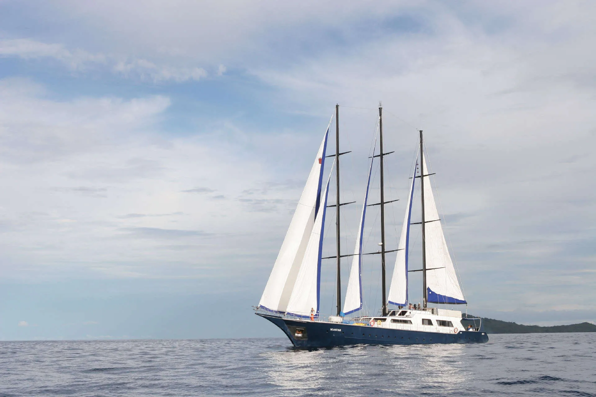 Sea Star under full sail on open water off the Seychelles
