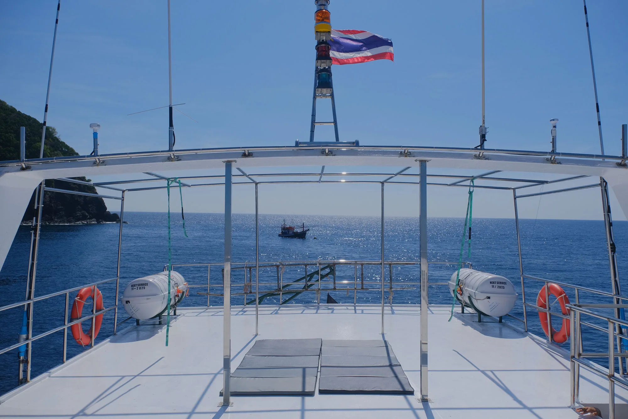 Seatopia's sun deck beneath the Thai flag