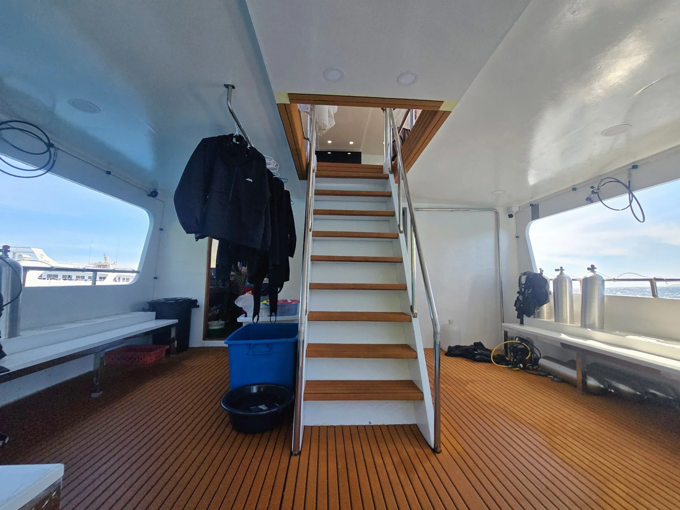Stairs from the dive deck to the upper deck and the rinse tanks