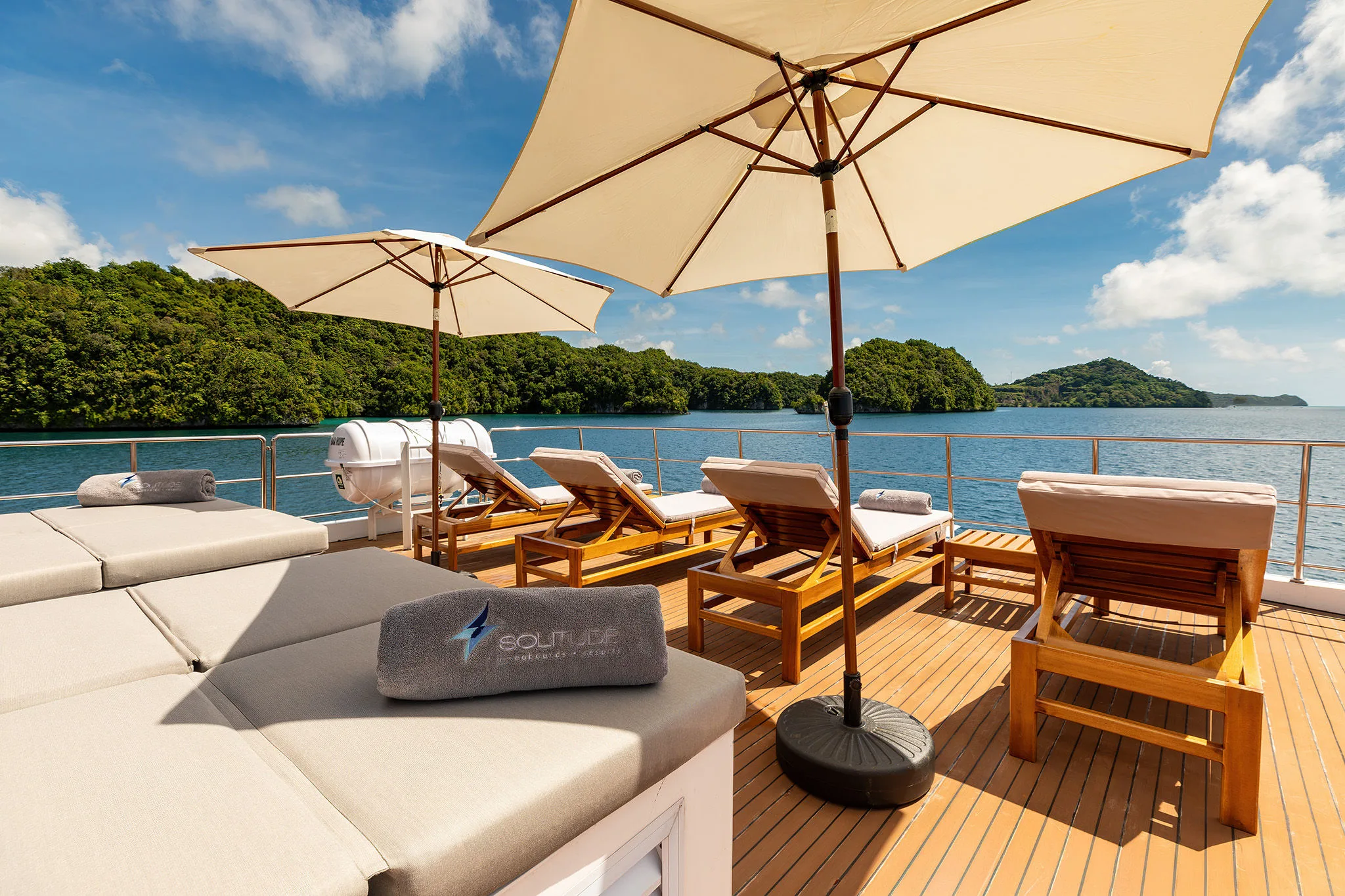 Sun deck of Solitude Gaia with loungers and parasols