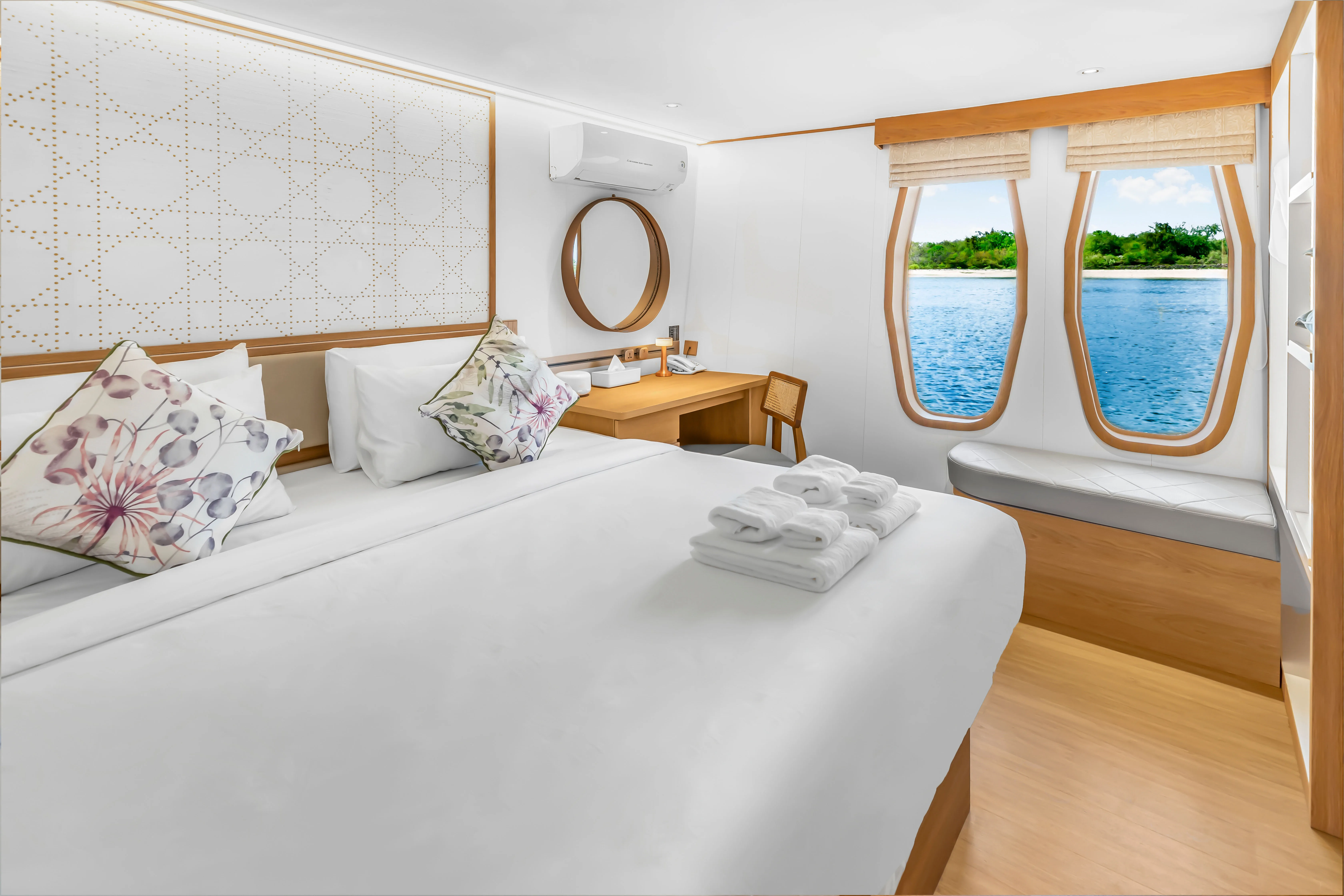 Main deck cabin on Solitude Gaia with a king-size bed
