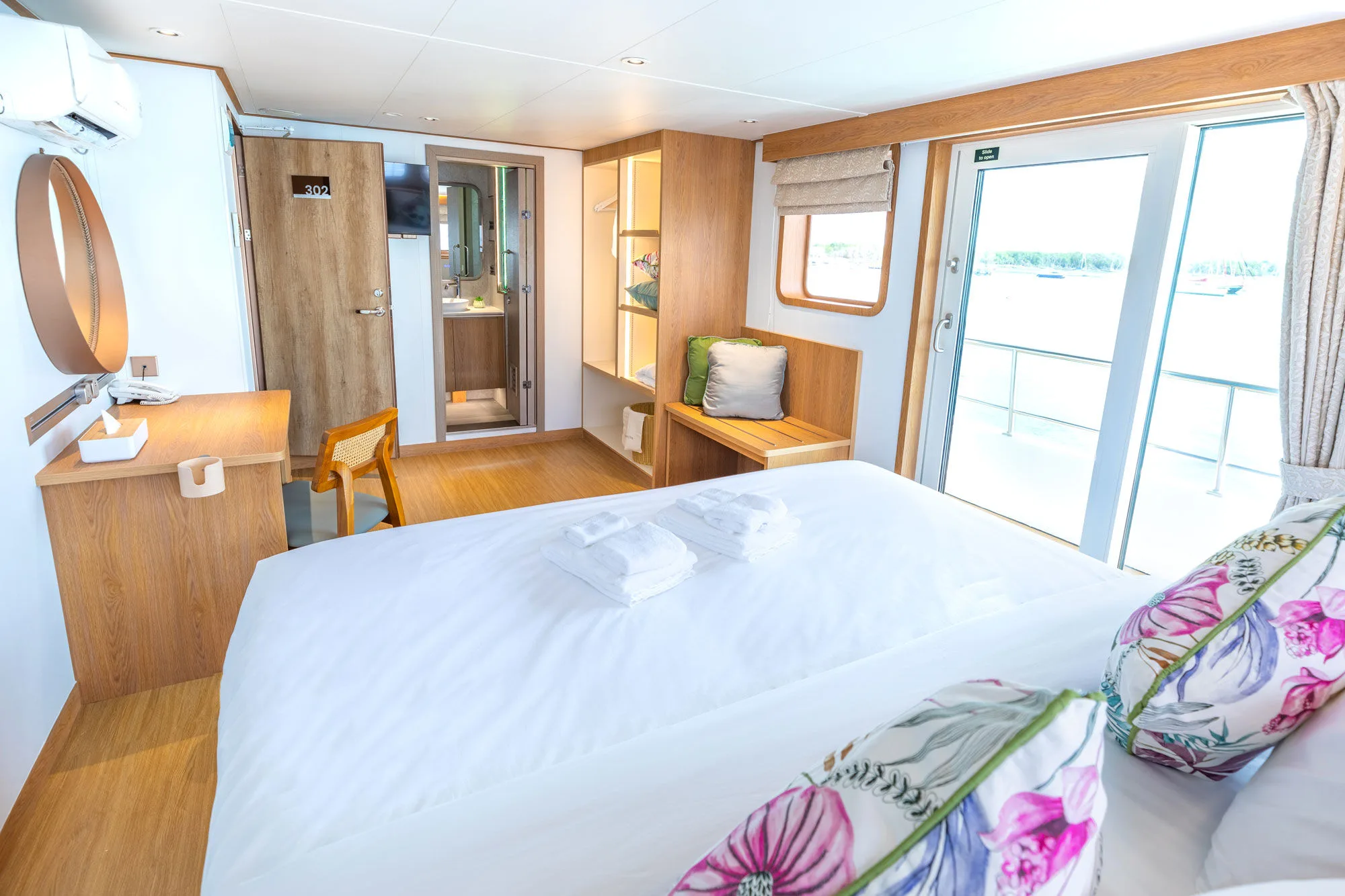 Stateroom on Solitude Gaia — headboard with a decorative panel