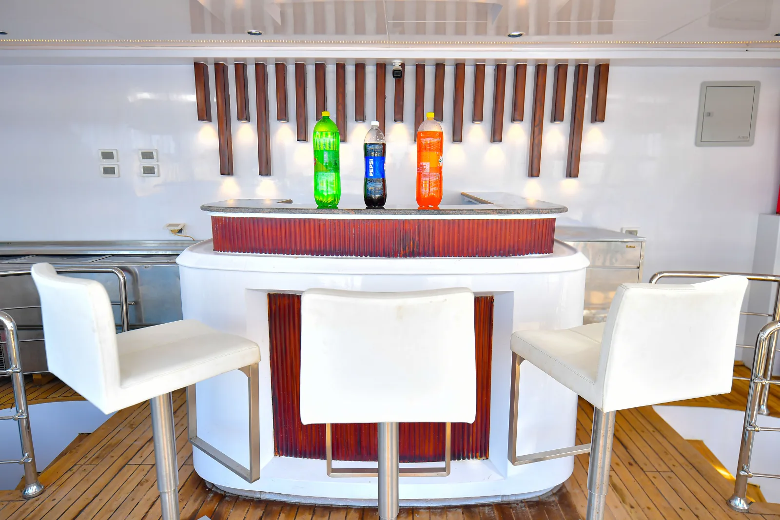 Bar on the sun deck with bar stools