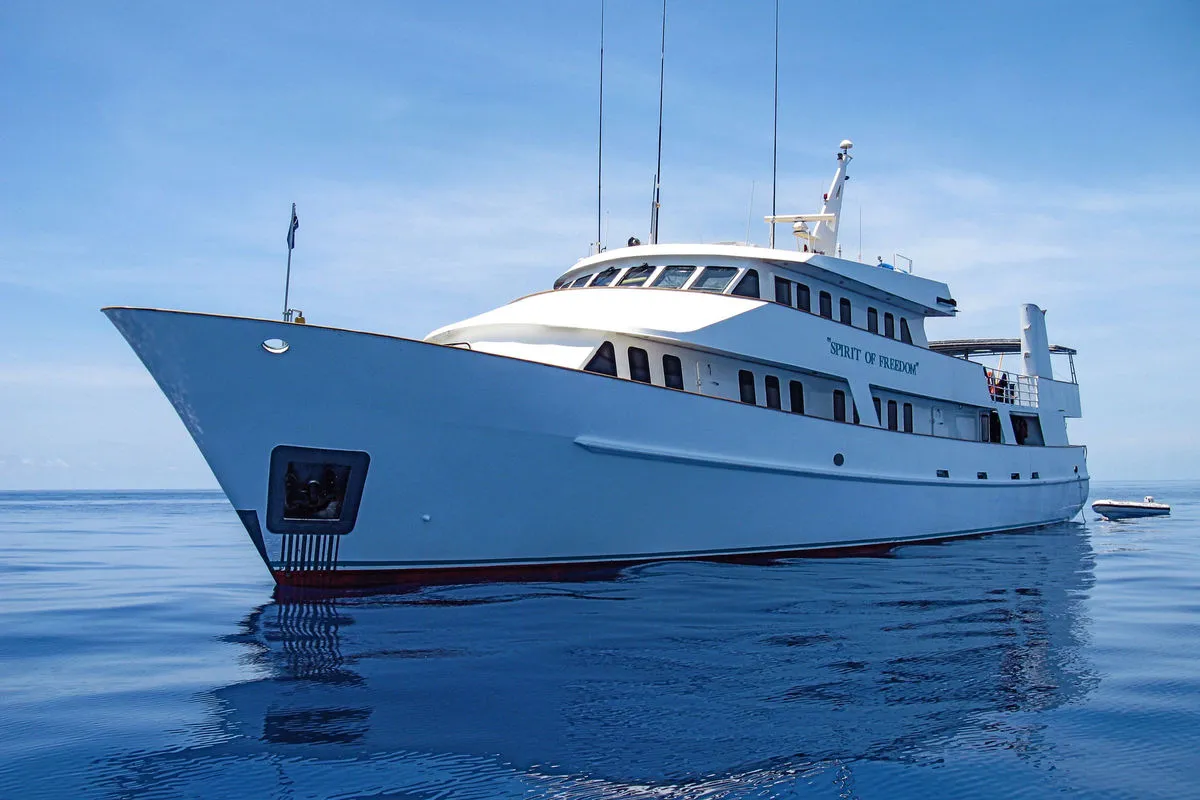 Spirit of Freedom at anchor on a flat calm off the Great Barrier Reef