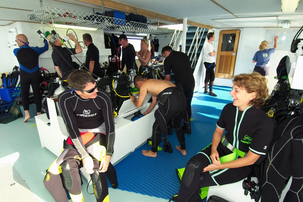 Guests kitting up on the dive deck of Spirit of Freedom