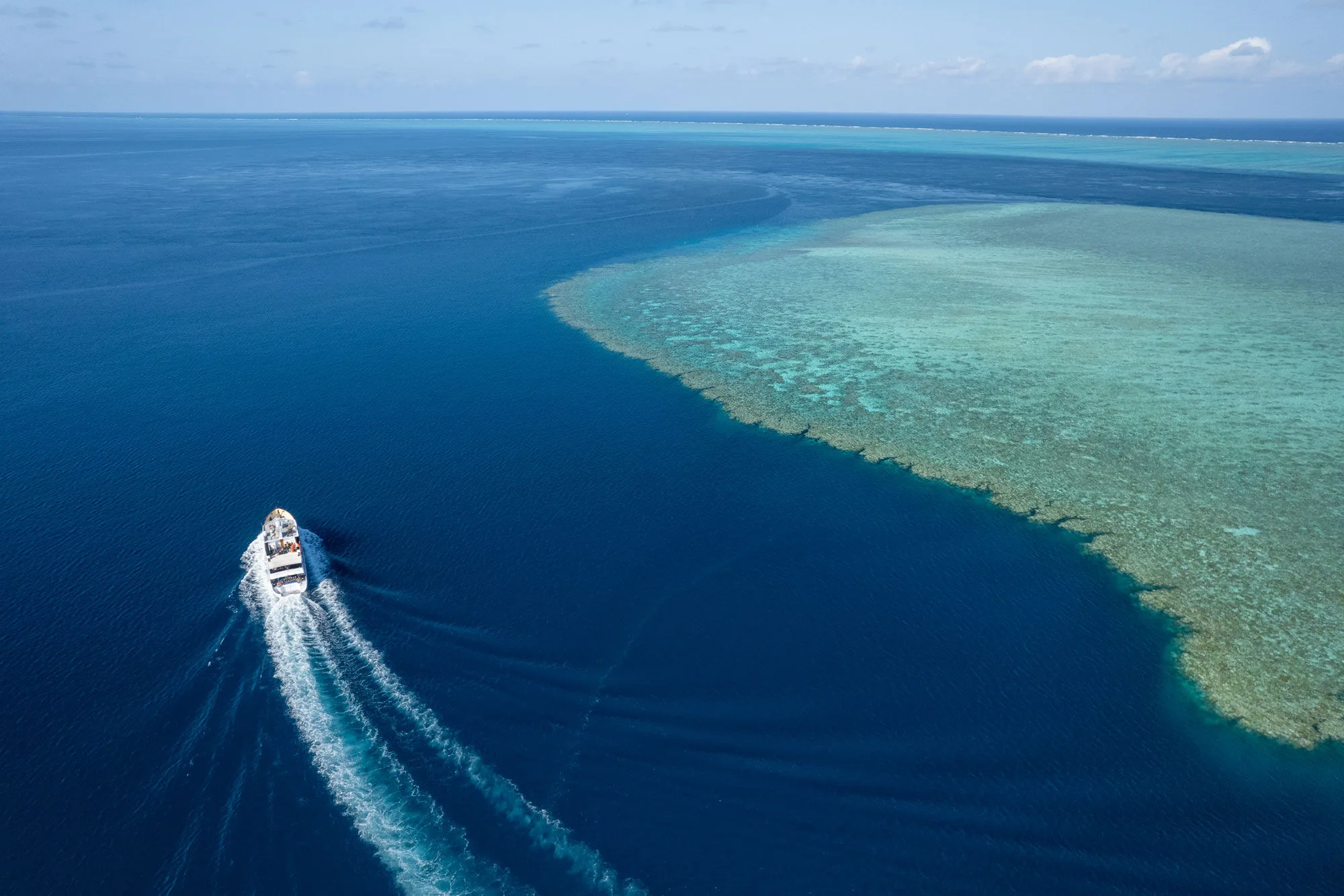 Spirit of Freedom under way along the wall of a Ribbon Reef