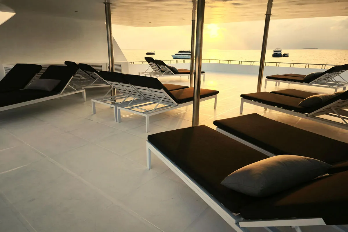 Upper deck loungers on Spirit of Maldives under the canopy