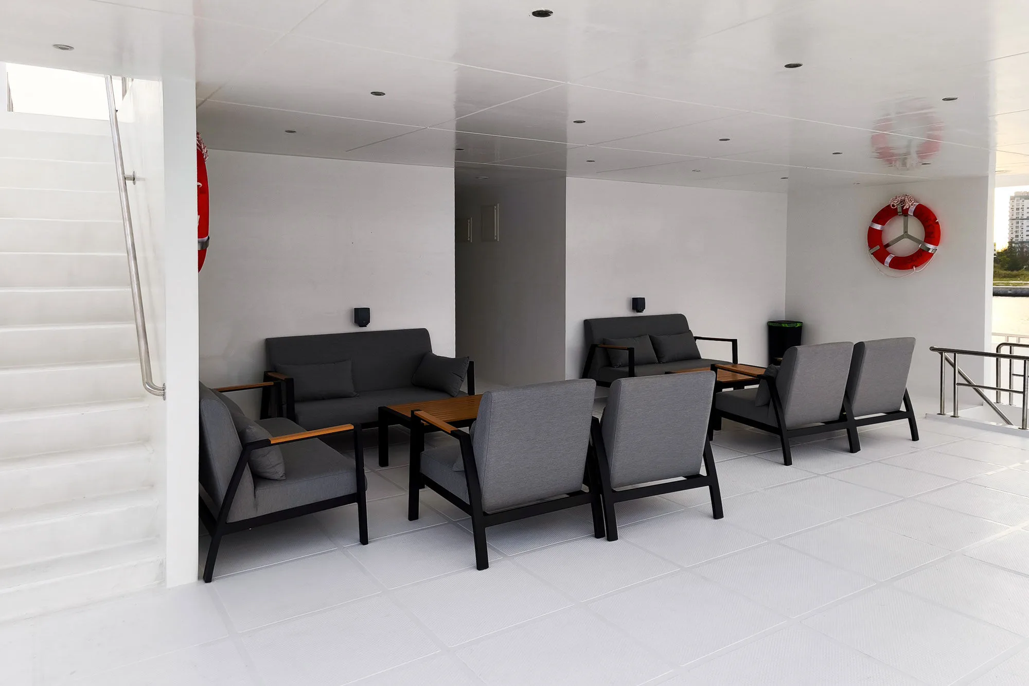 Covered lounge area on the upper deck stern of Spirit of Maldives