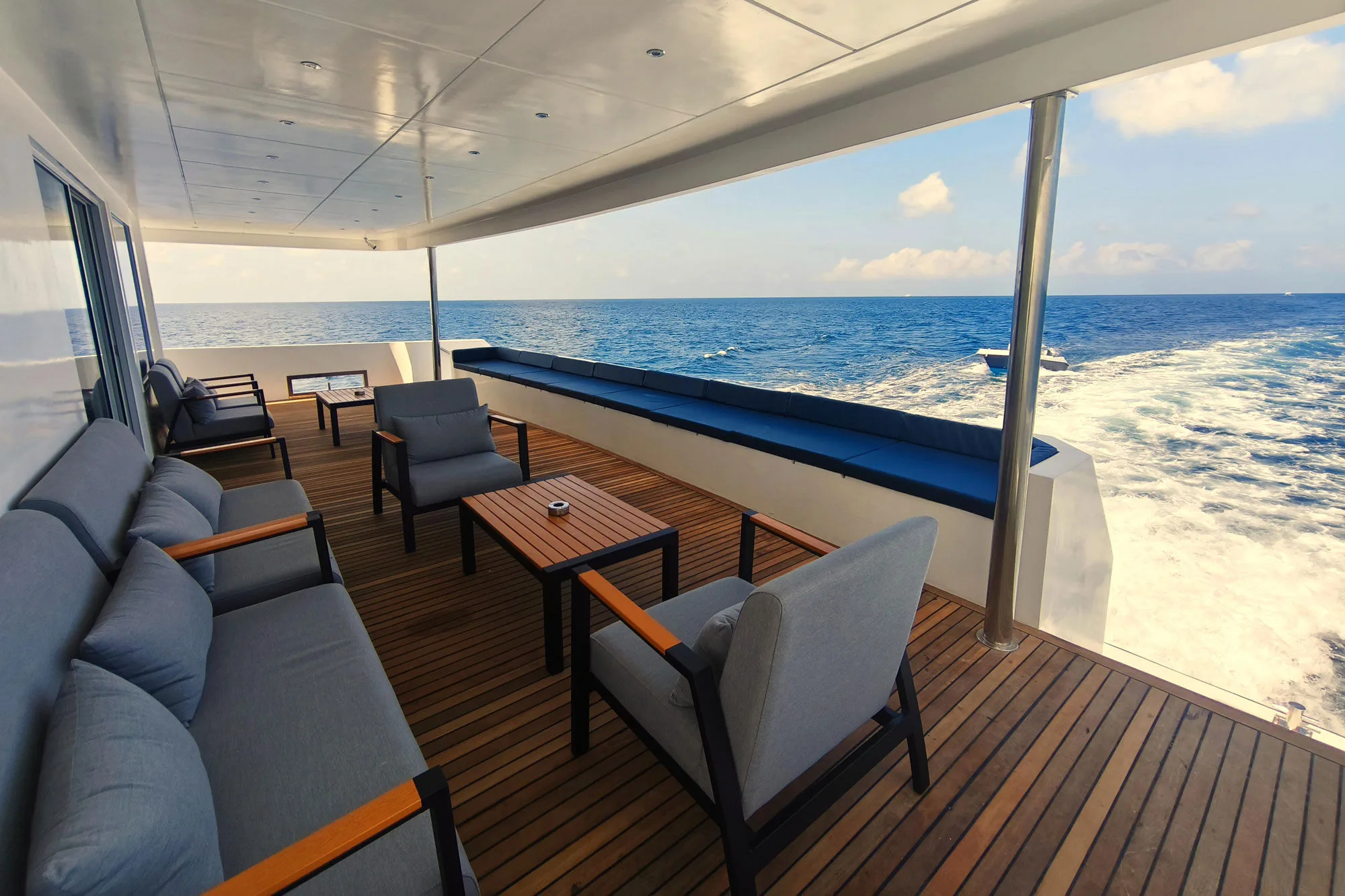 Stern lounge area of Spirit of Maldives underway