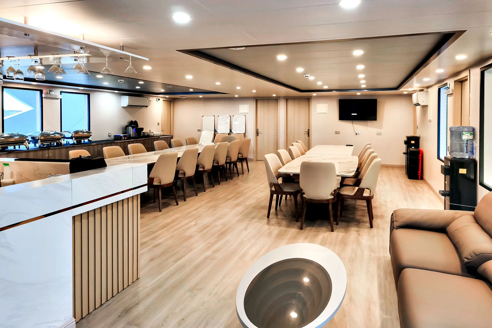 Saloon of Spirit of Maldives — bar, dining table and lounge area