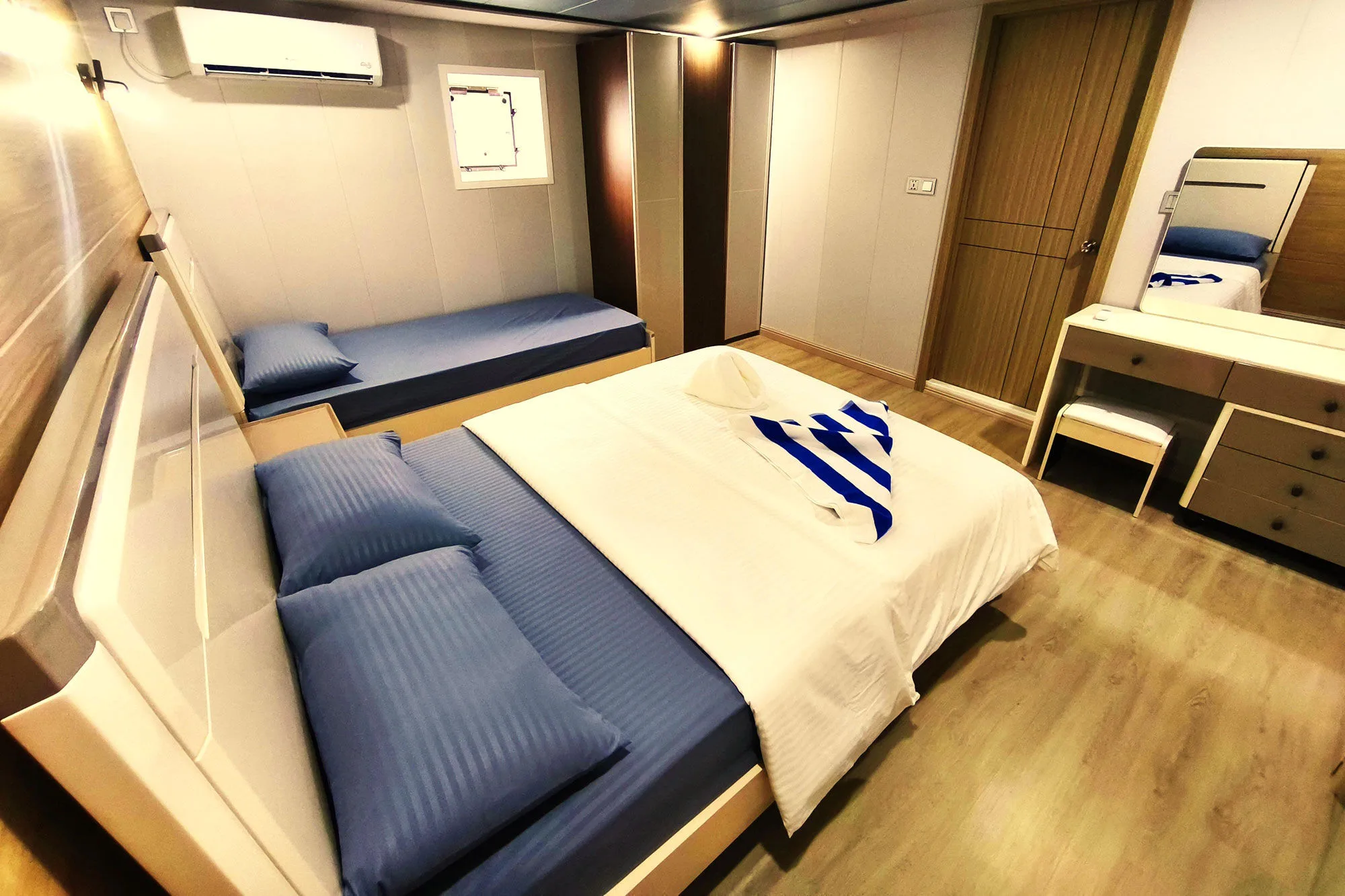 Standard cabin on Spirit of Maldives seen from the door