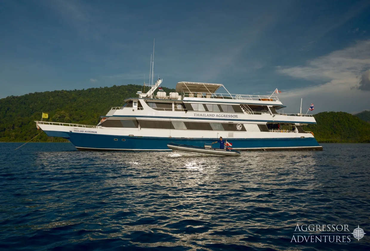 Thailand Aggressor with a tender against a tropical island