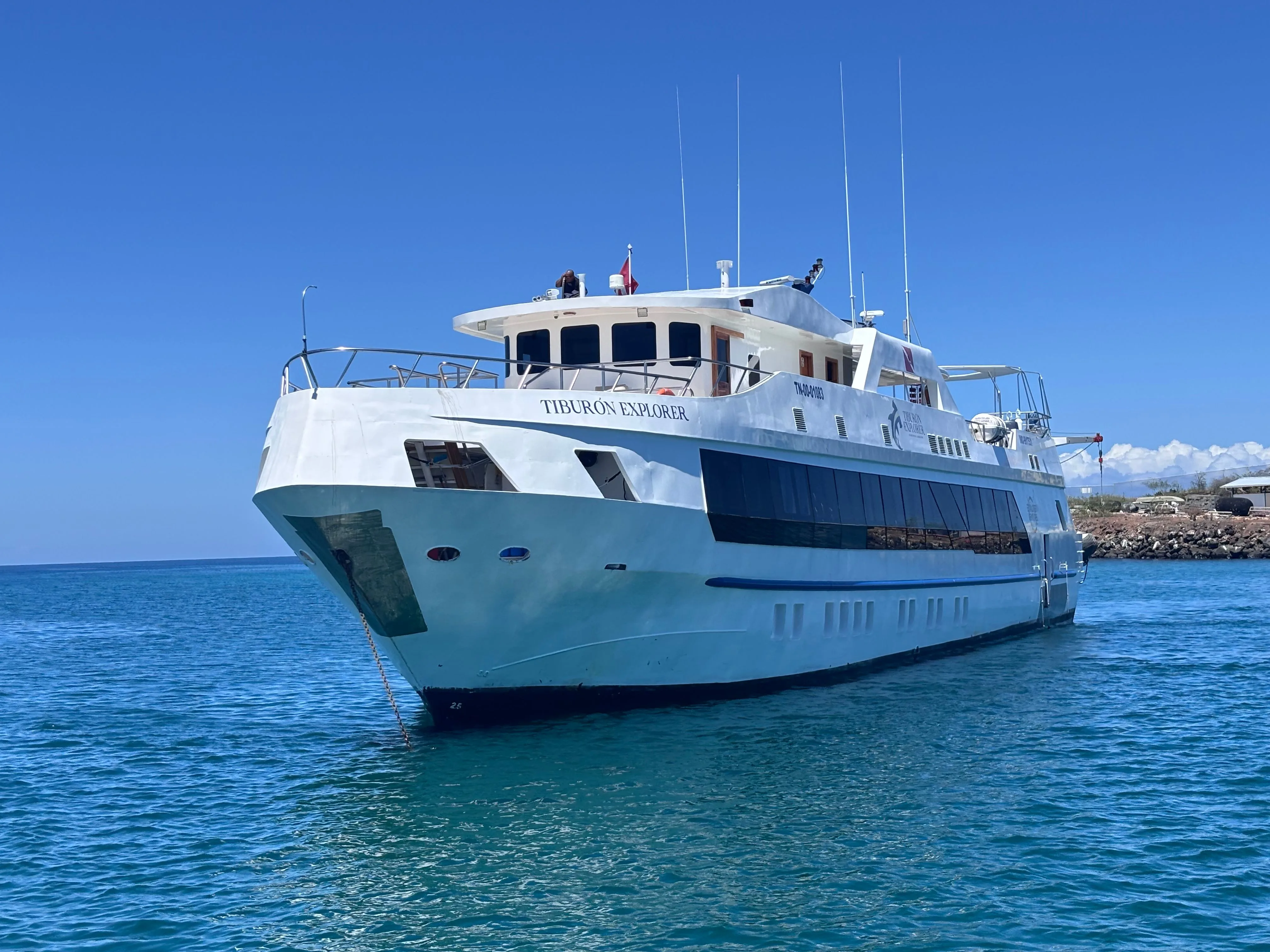 Tiburon Explorer close to a Galapagos shoreline