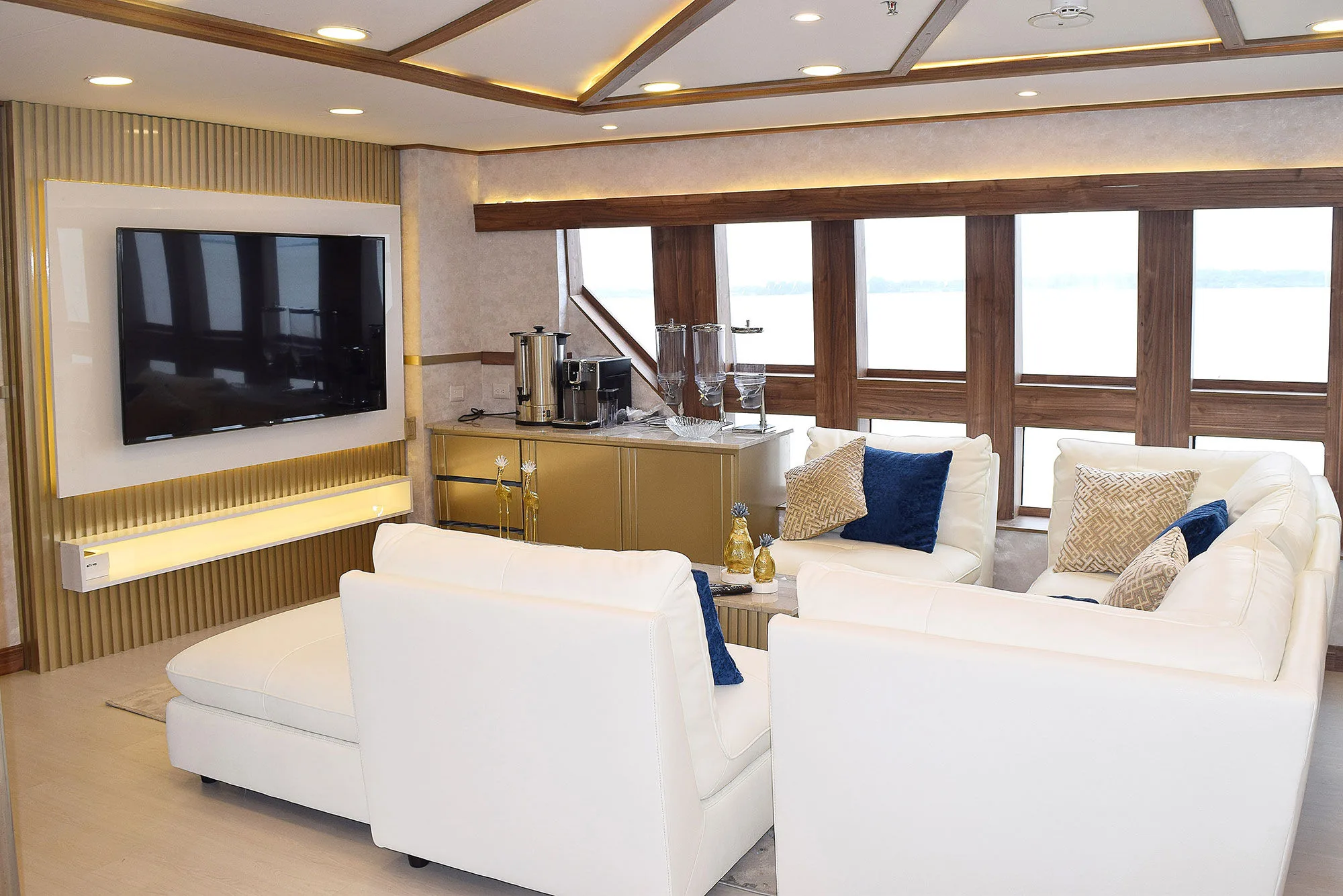 Lounge seating in the Tiburon Explorer salon with ocean views