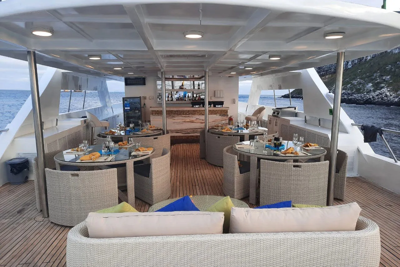 Shaded tables on the aft deck of Tiburon Explorer