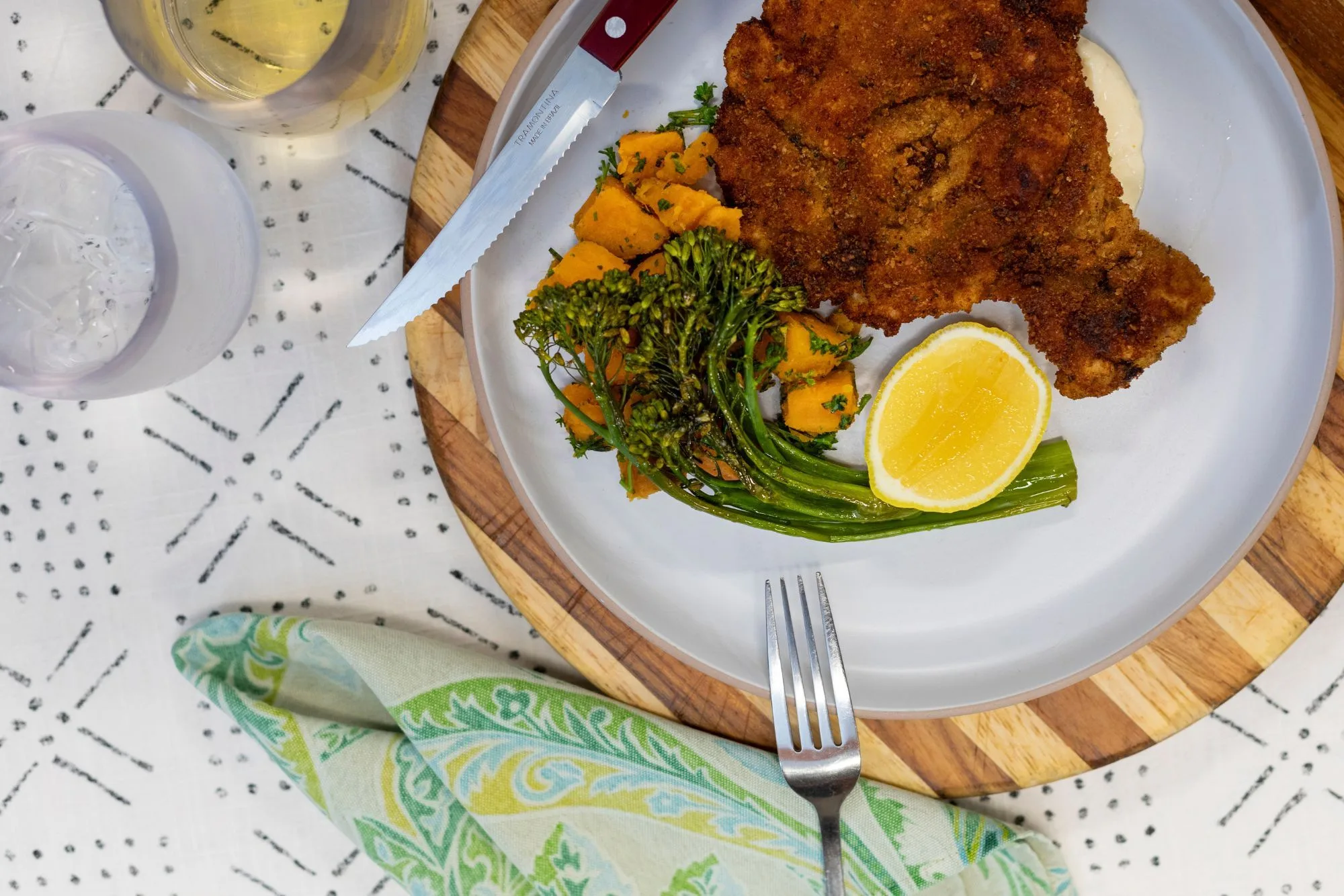 Main course with broccolini and lemon served in the salon