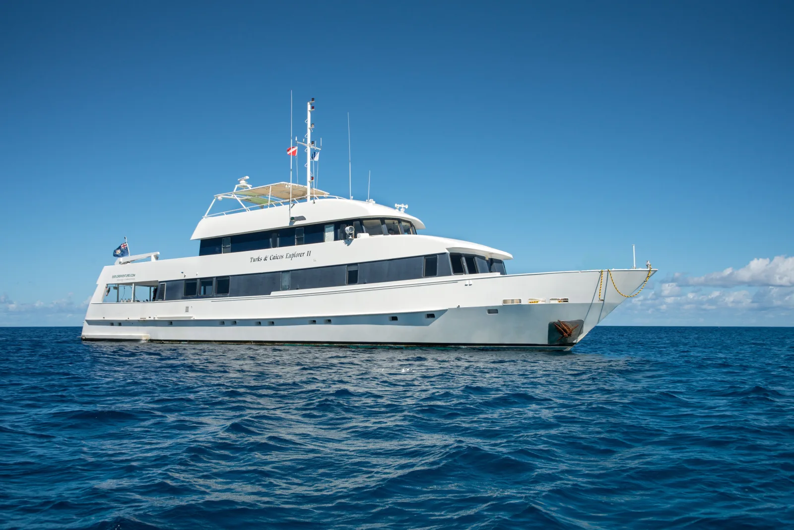 Turks & Caicos Explorer II at anchor in open water, starboard side