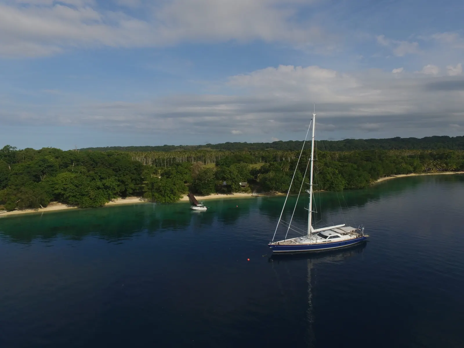 A yacht on a mooring off the island