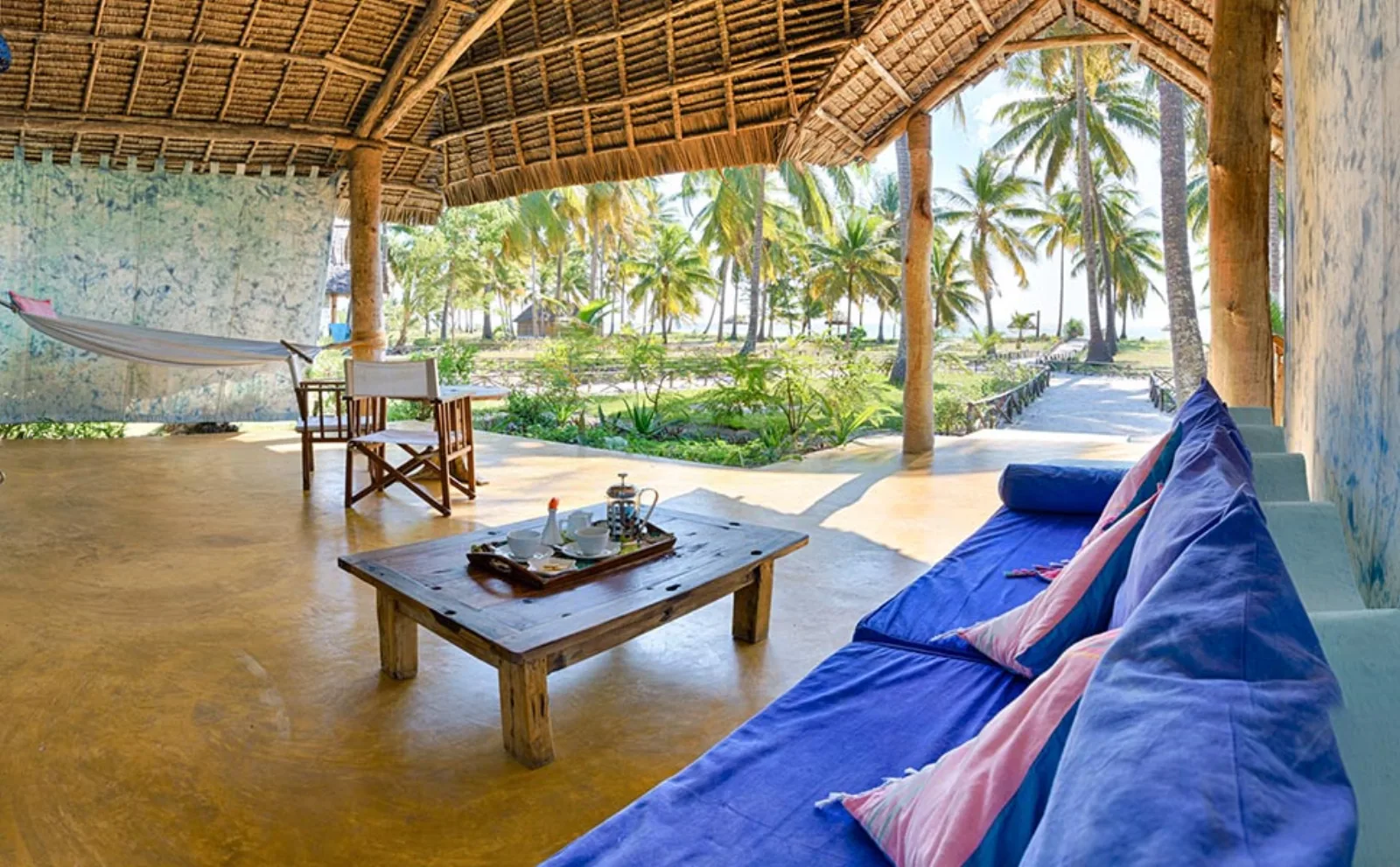 Bungalow veranda with a hammock and ocean view