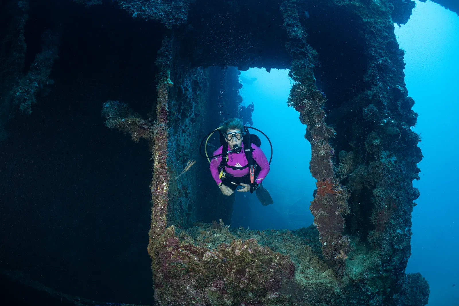 A diver framed in an opening of the Toa Maru