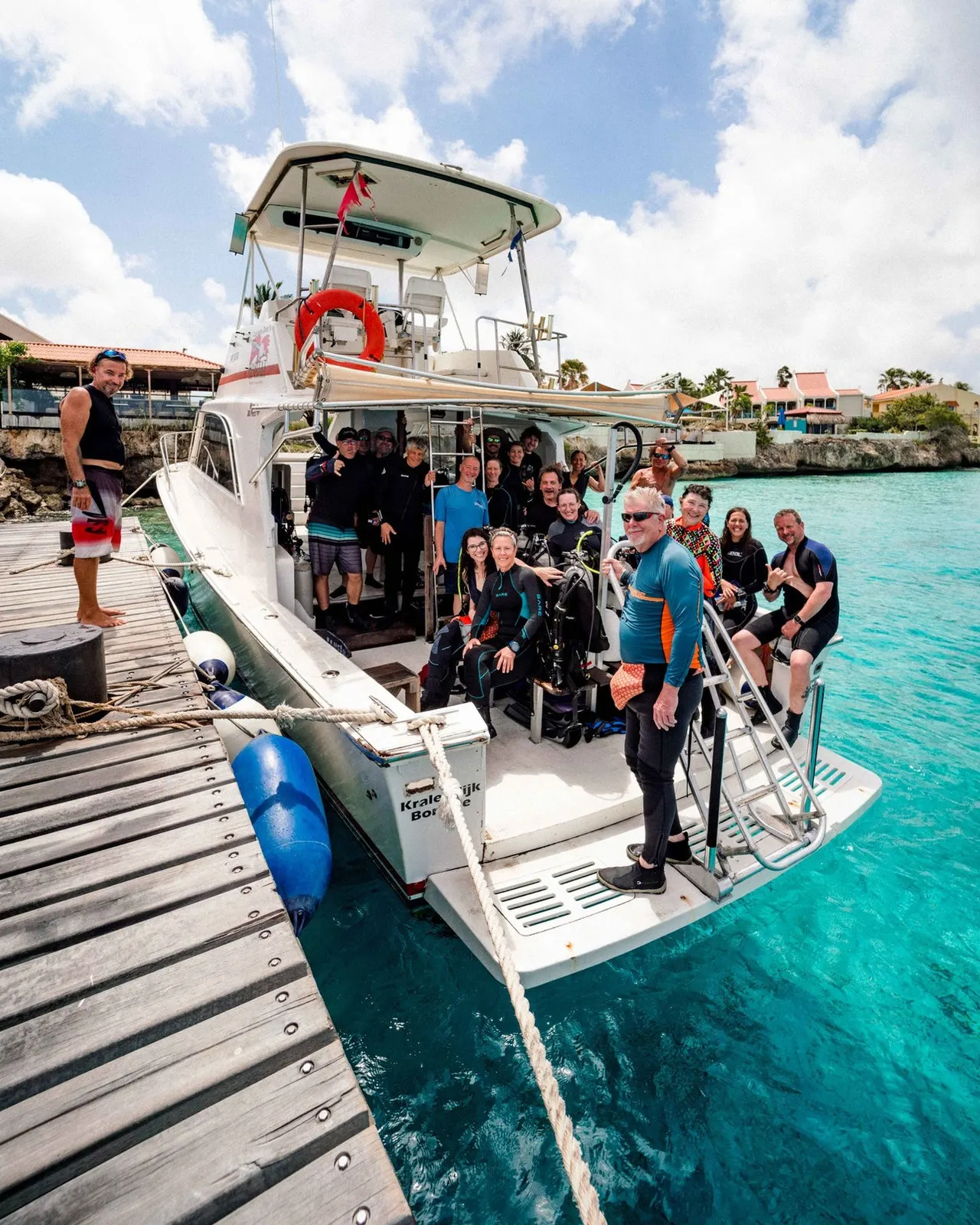 Divers on the boat at the dock