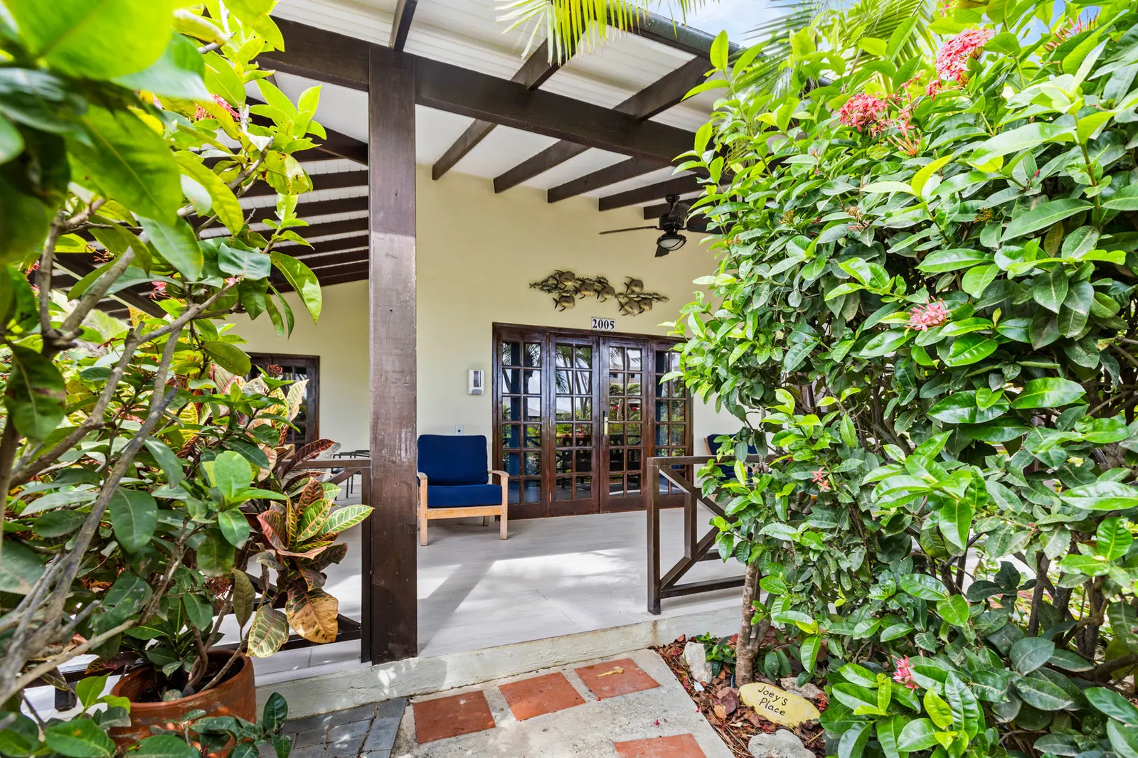 The bungalow entrance among the greenery