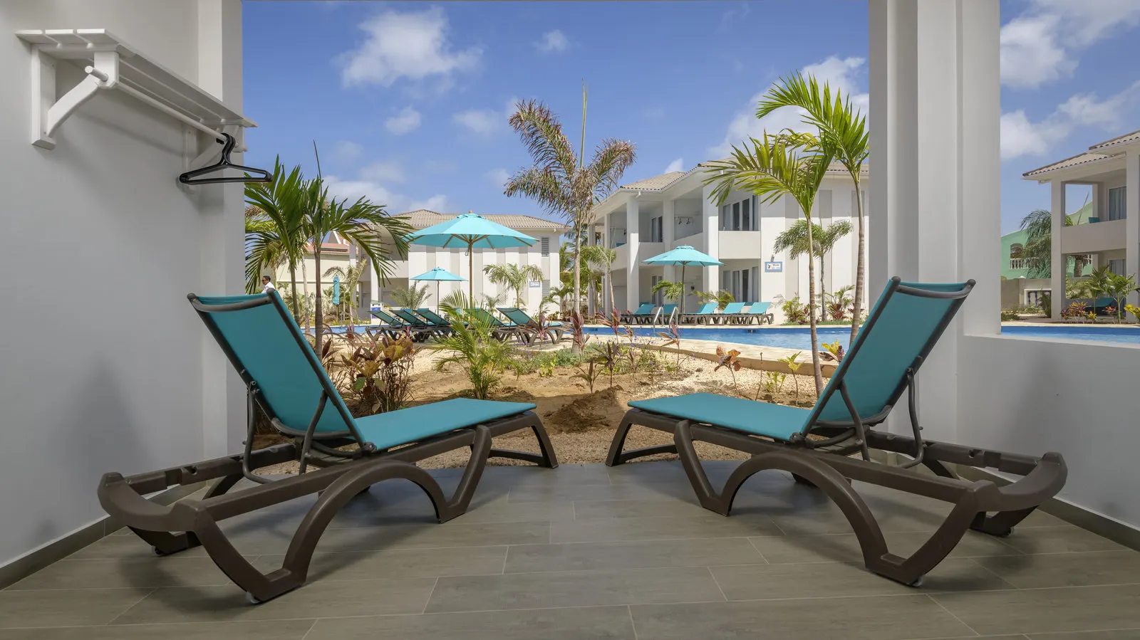 Loungers on the room's patio